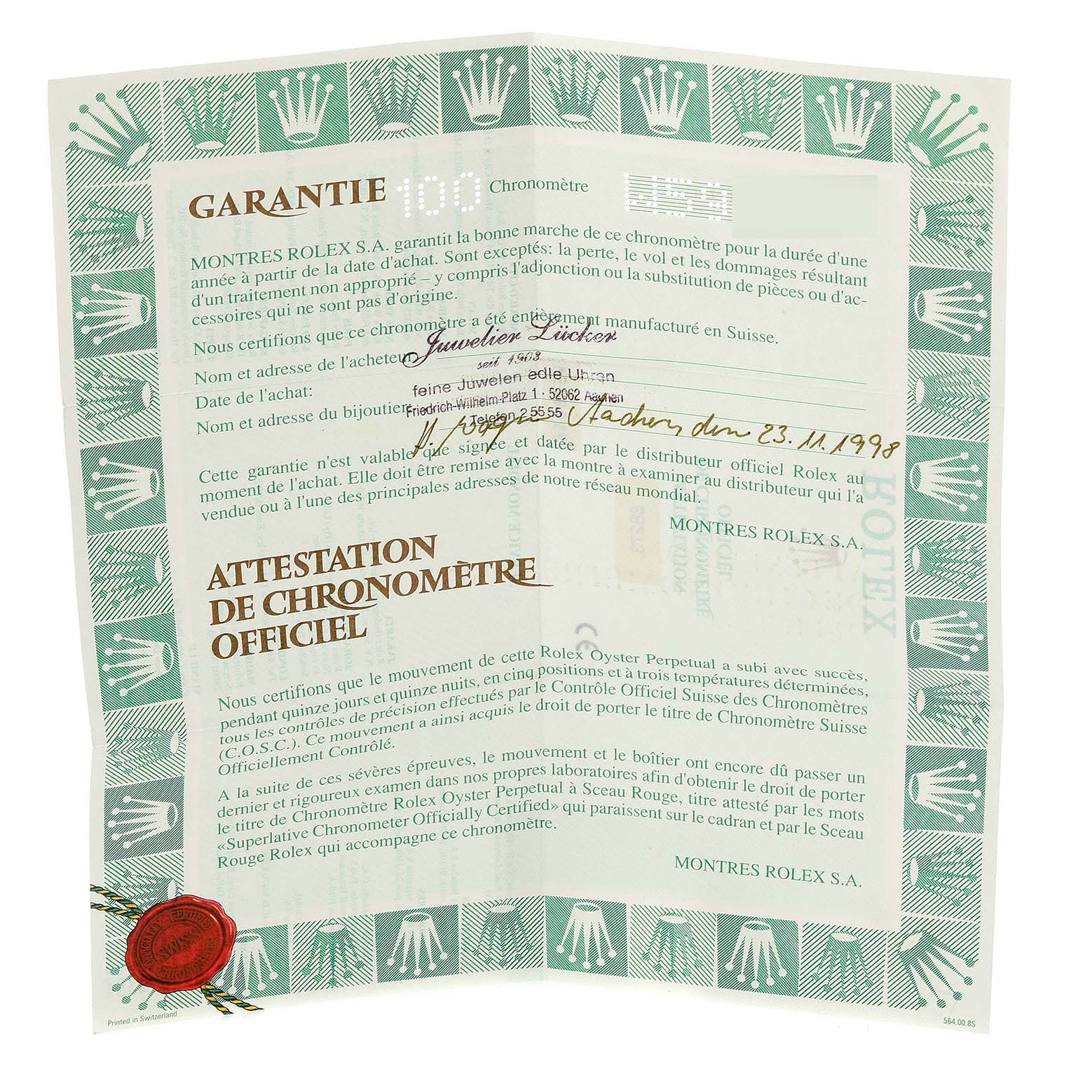 The image shows an official warranty and chronometer certificate for a Mid-Size Rolex watch, including text and signatures.