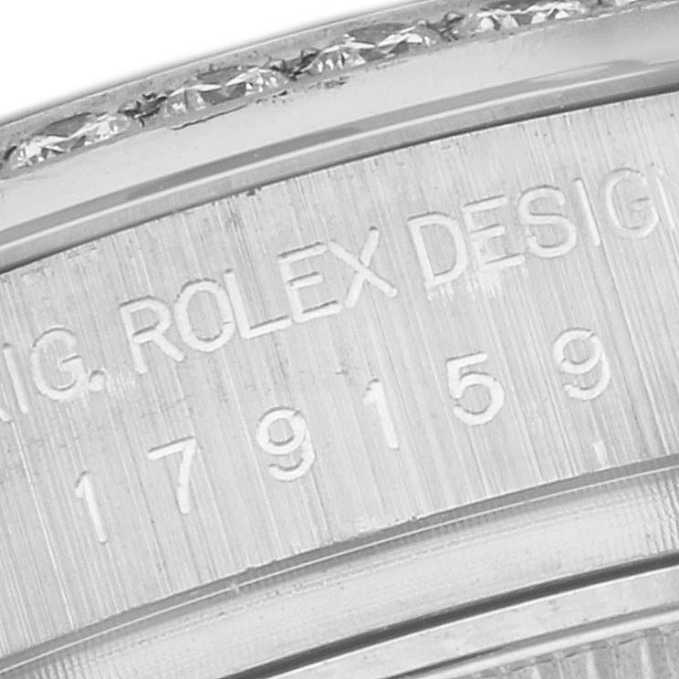 Close-up of the engraved bezel and serial number area of the Rolex President 179159 Women's White Gold Mother of Pearl Dial 179159 Women's White Gold Mother of Pearl Dial model watch.