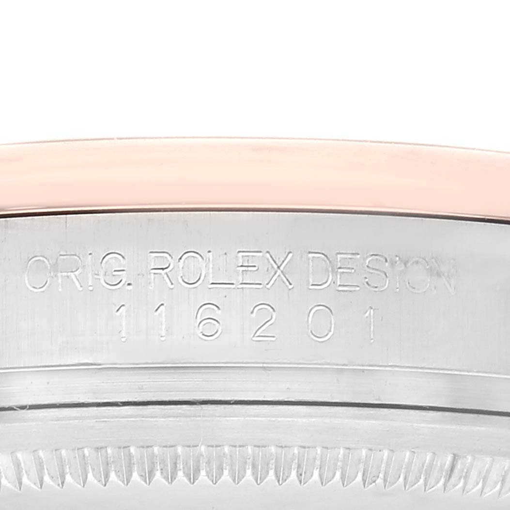 This image shows the side view of the case with model number engraving on a Rolex Datejust 116201 Men's Steel and Gold (two tone) White Dial 116201 Men's Steel and Gold (two tone) White Dial watch.