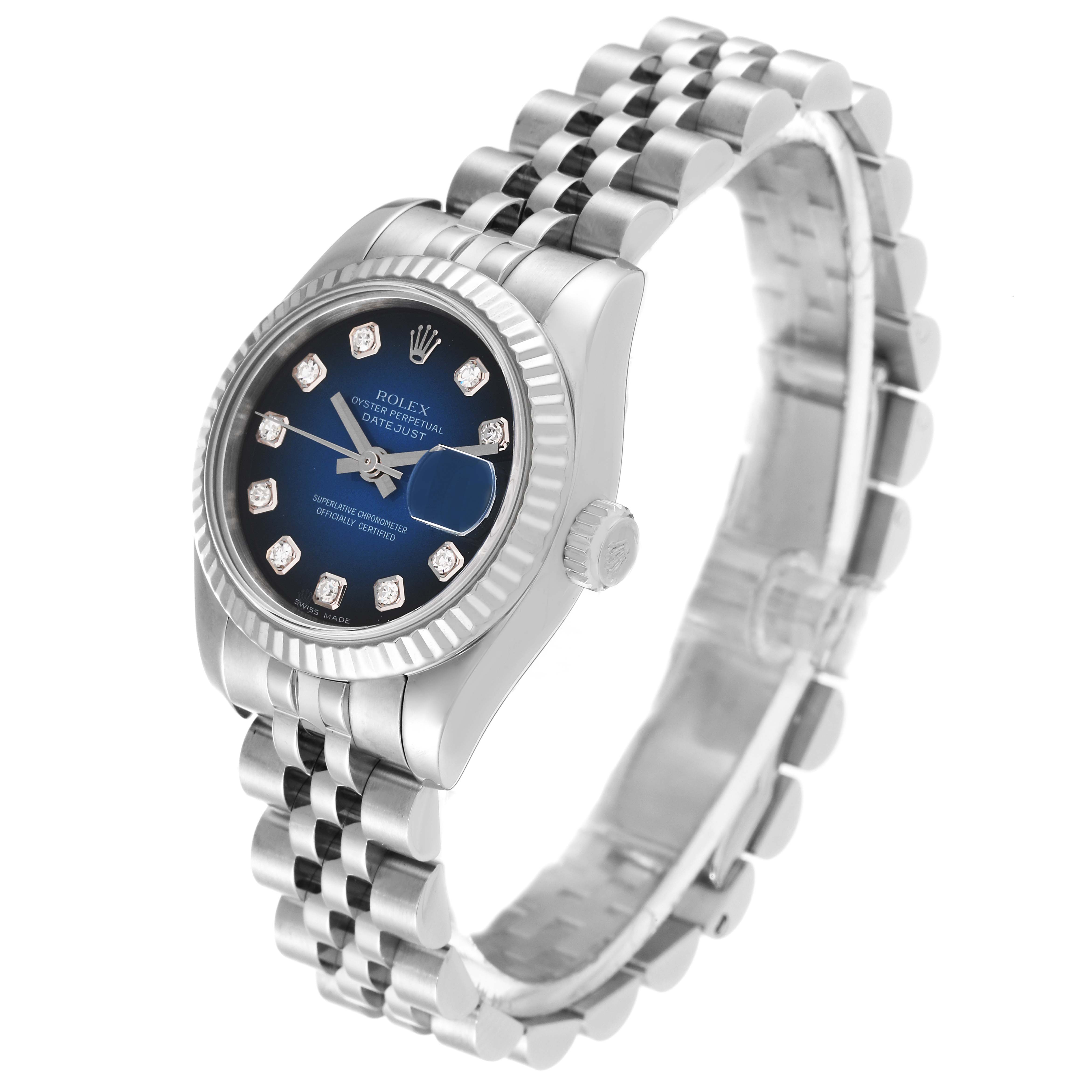 The Rolex Datejust 179174 Women's Stainless Steel Blue Dial 179174 Women's Stainless Steel Blue Dial watch is shown at a three-quarter angle, displaying the face, bezel, crown, and bracelet.