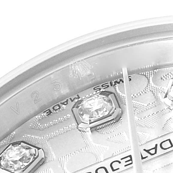 The image shows a close-up of the dial, including diamond markers and the edge with engraved text, of a Rolex Datejust 179174 Women's Stainless Steel Silver Dial 179174 Women's Stainless Steel Silver Dial watch.