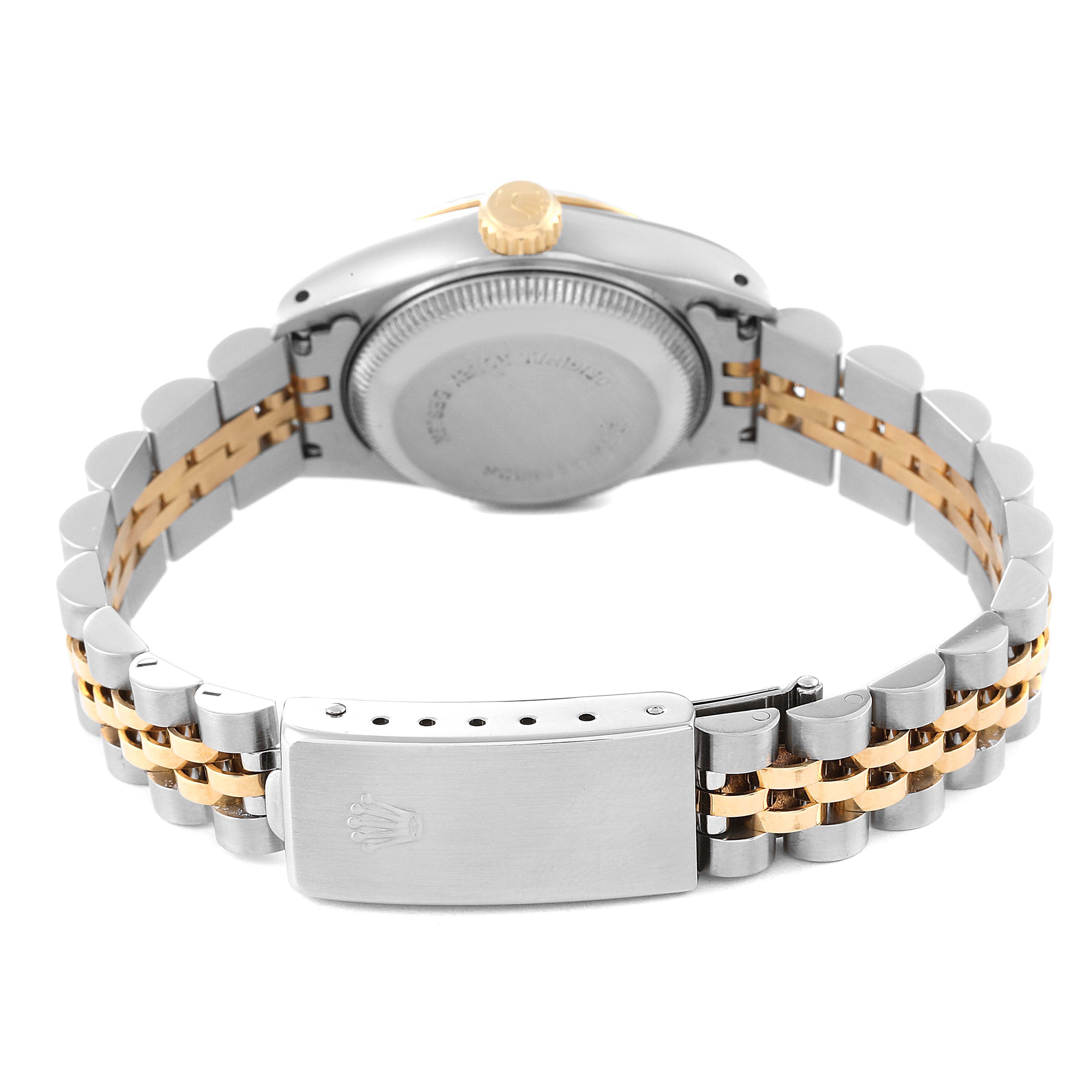 The image shows the back view of a Rolex Datejust 69173 Women's Steel and Gold (two tone) Beige Dial 69173 Women's Steel and Gold (two tone) Beige Dial watch, highlighting its clasp, bracelet, and case back.