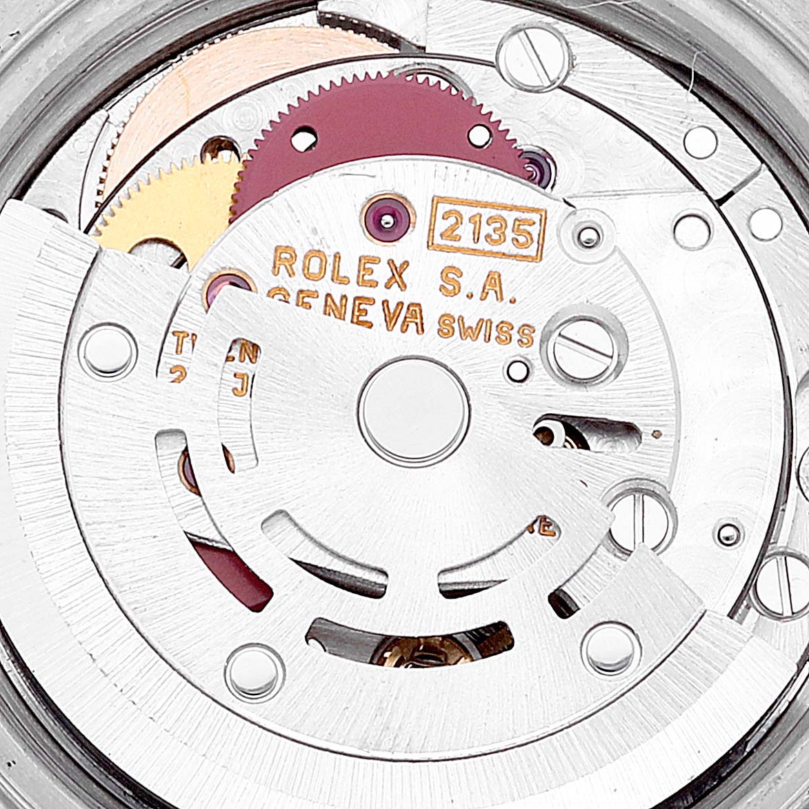The image shows the internal mechanism of a Rolex Datejust 69173 Women's Steel and Gold (two tone) Beige Dial 69173 Women's Steel and Gold (two tone) Beige Dial model, displaying gears and the rotor from a top-down view.