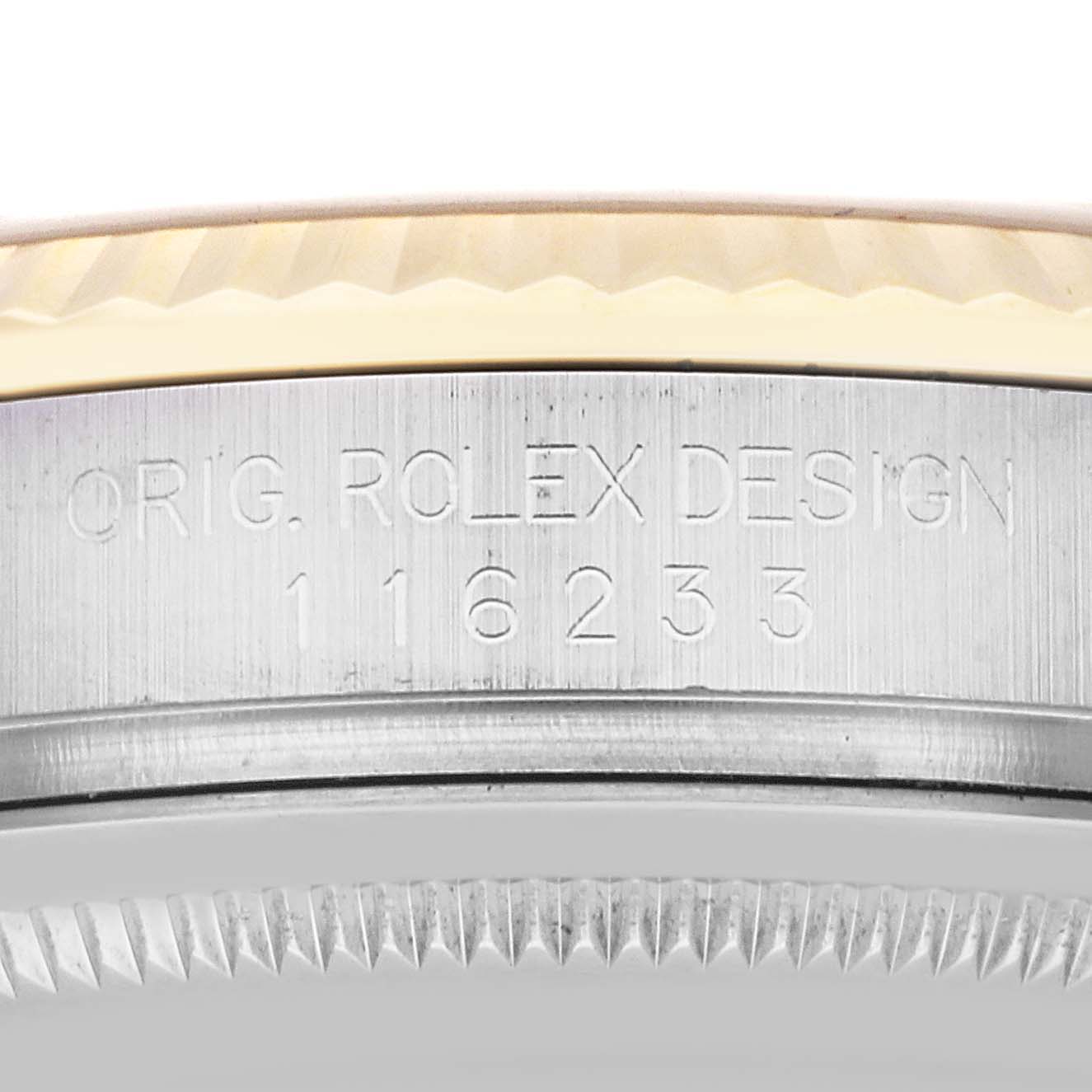 The image shows a close-up of the serial number and bezel of a Rolex Datejust 116233 Men's Steel and Gold (two tone) Champagne Dial 116233 Men's Steel and Gold (two tone) Champagne Dial model.