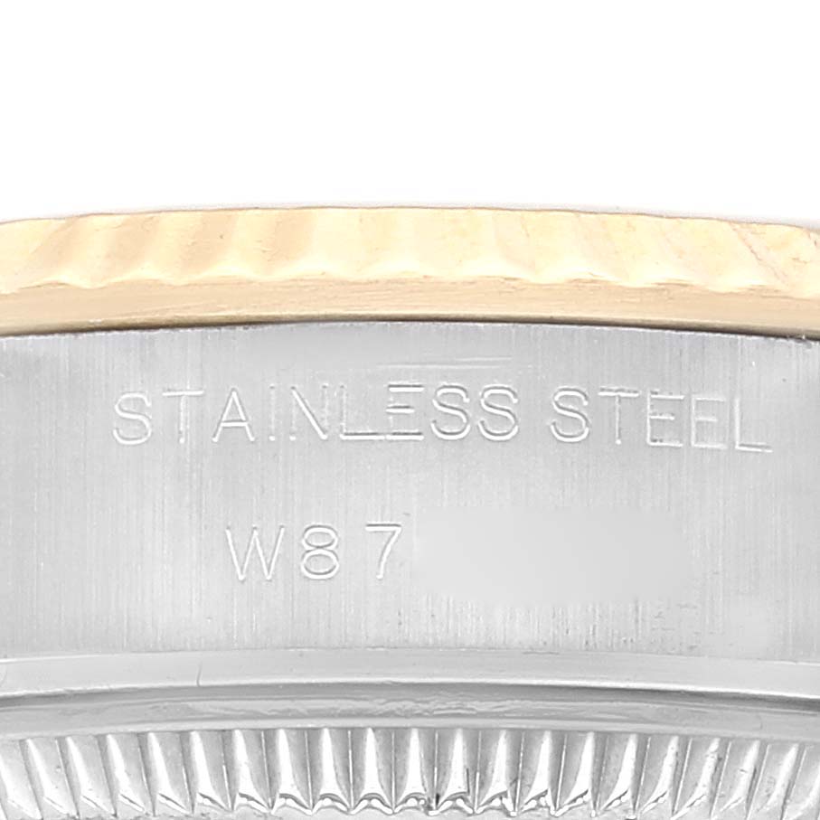This image shows an engraved side view of the Rolex Datejust 69173 Women's Steel and Gold (two tone) Champagne Dial 69173 Women's Steel and Gold (two tone) Champagne Dial watch case, highlighting "STAINLESS STEEL" text.