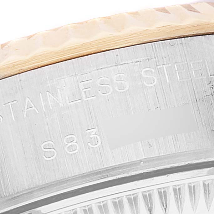 The image shows a close-up of the stainless steel and fluted bezel from a Rolex Datejust 69173 Women's Steel and Gold (two tone) Champagne Dial 69173 Women's Steel and Gold (two tone) Champagne Dial watch.