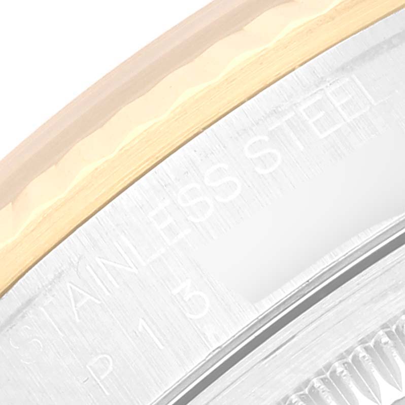 The image shows a close-up of the Rolex Datejust 16233 Men's Steel and Gold (two tone) White Dial 16233 Men's Steel and Gold (two tone) White Dial model, highlighting the bezel and part of the case with "Stainless Steel" engraving visible.