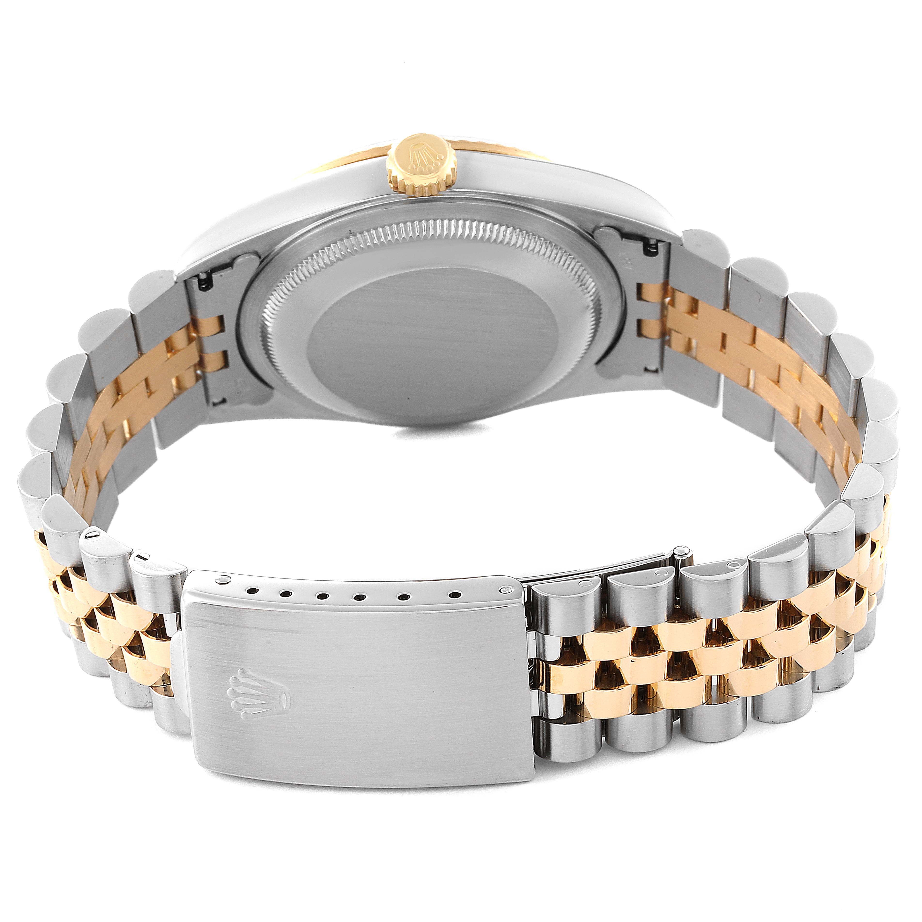 The image shows the back side of a Rolex Datejust 16233 Men's Steel and Gold (two tone) White Dial 16233 Men's Steel and Gold (two tone) White Dial watch, focusing on the case back, bracelet, and clasp.
