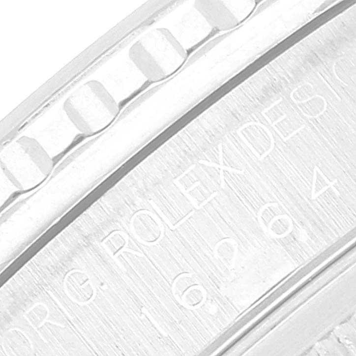 This is a close-up image of the bezel and part of the case of a Rolex Turn-o-Graph 16264 Men's Stainless Steel White Dial 16264 Men's Stainless Steel White Dial watch.