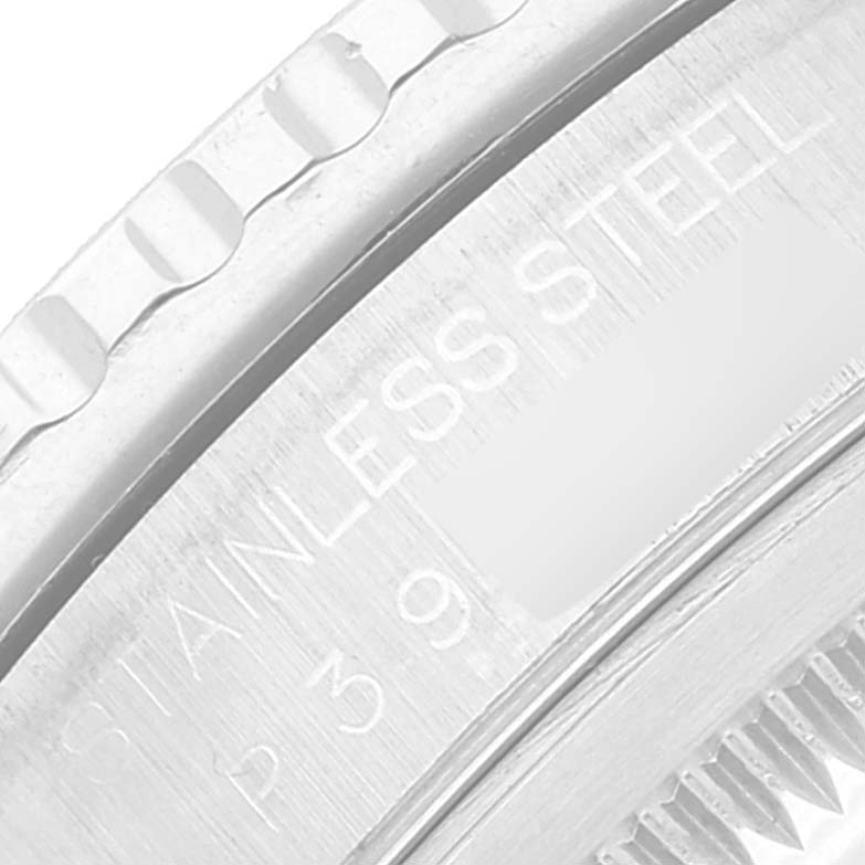 The image shows a close-up of the bezel and the engraved stainless steel text on a Rolex Turn-o-Graph 16264 Men's Stainless Steel White Dial 16264 Men's Stainless Steel White Dial watch.