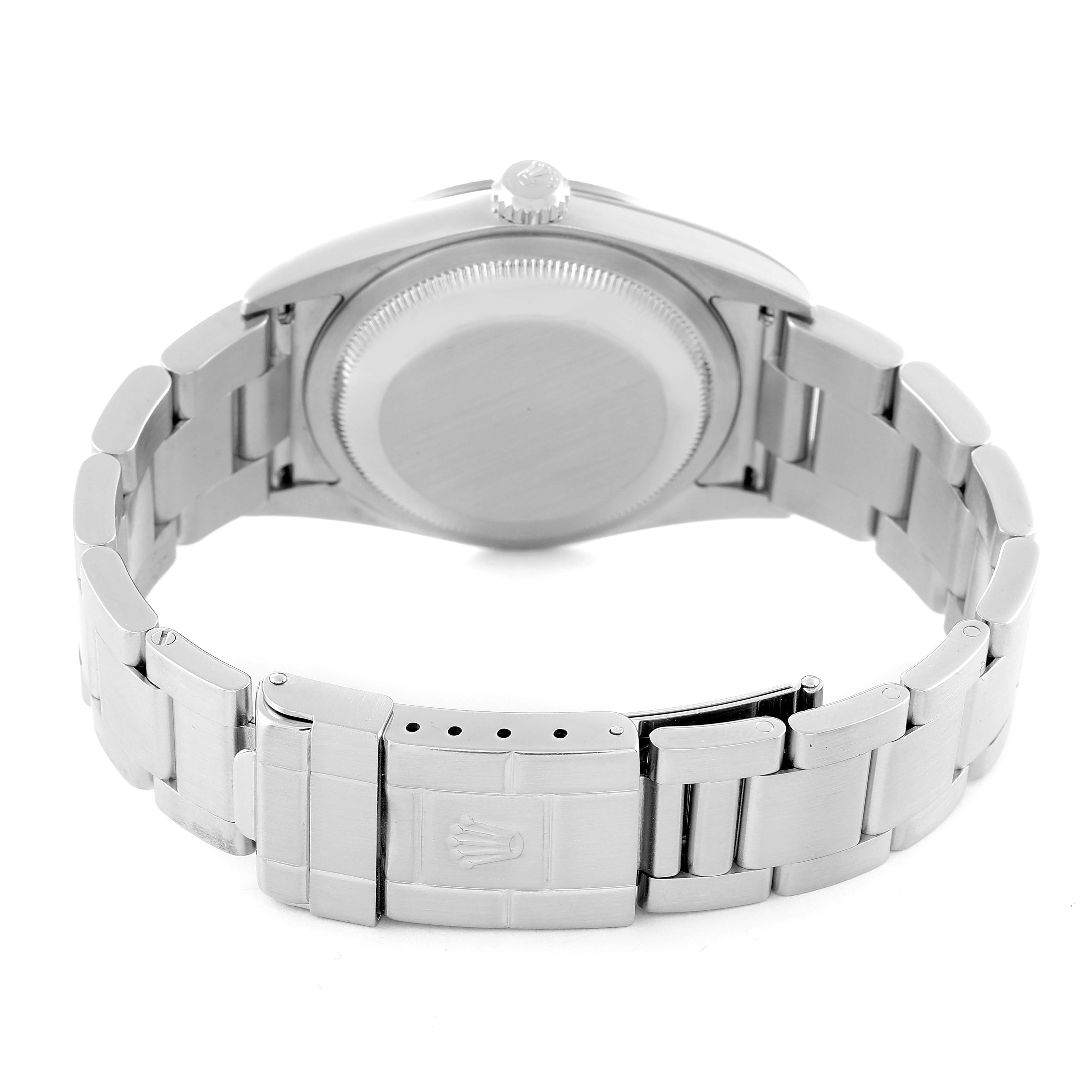 This image shows the back case and bracelet clasp of a Rolex Explorer 114270 Men's Stainless Steel Black Dial 114270 Men's Stainless Steel Black Dial watch.