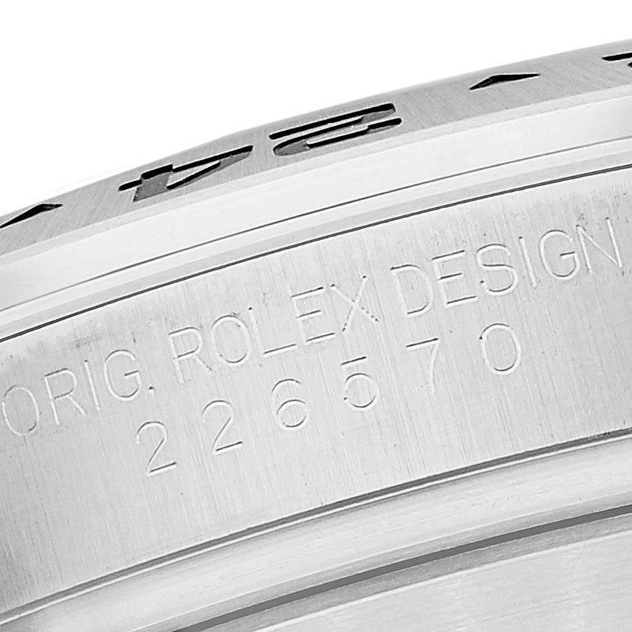 The image shows the side view of the bezel and engraved case back of a Rolex Explorer 226570 Men
s Stainless Steel White Dial 226570 Men
s Stainless Steel White Dial watch, displaying its model number.