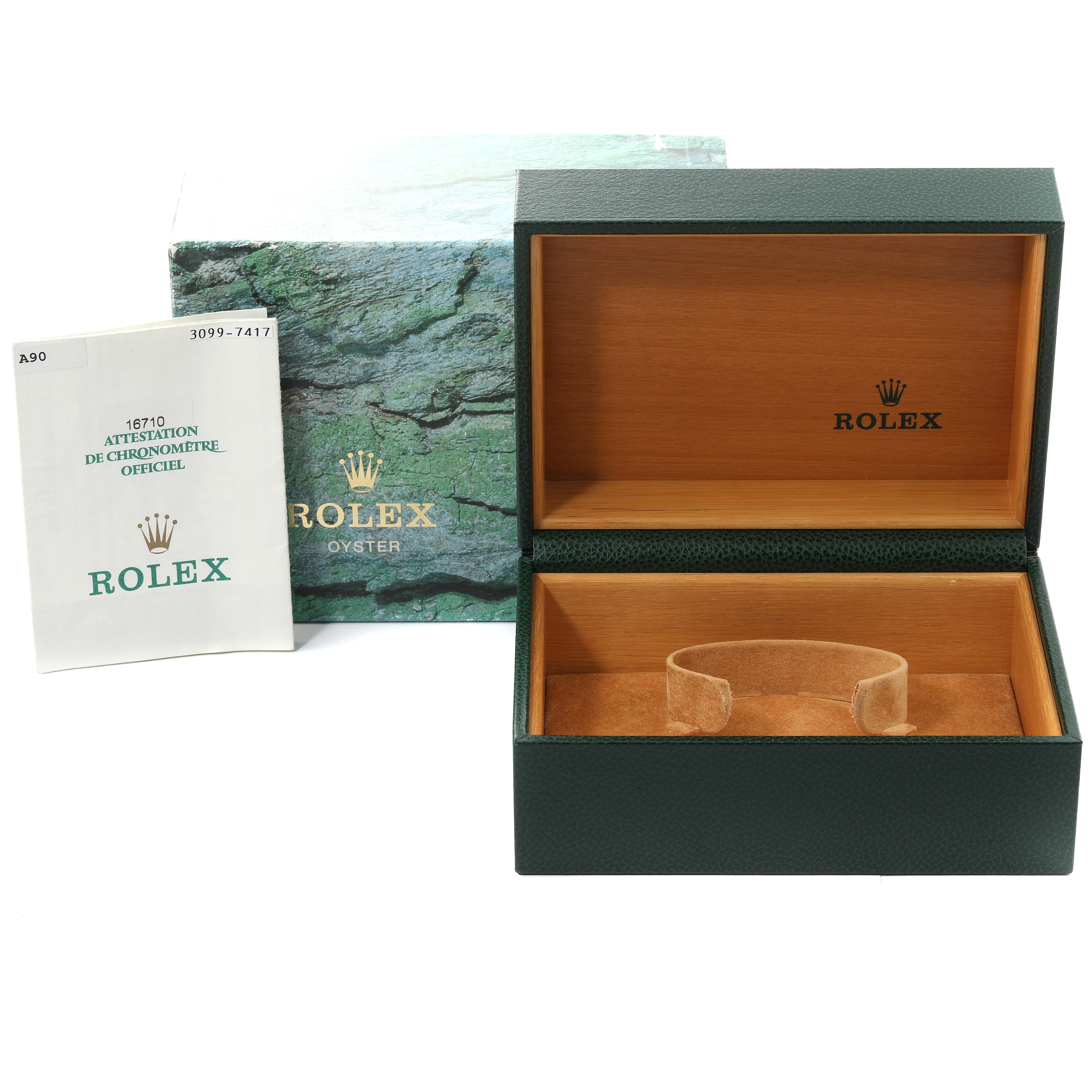 The image shows the packaging and booklet for the Rolex GMT-Master 16710 Men's Stainless Steel Black Dial 16710 Men's Stainless Steel Black Dial, including an open watch box and outer box.