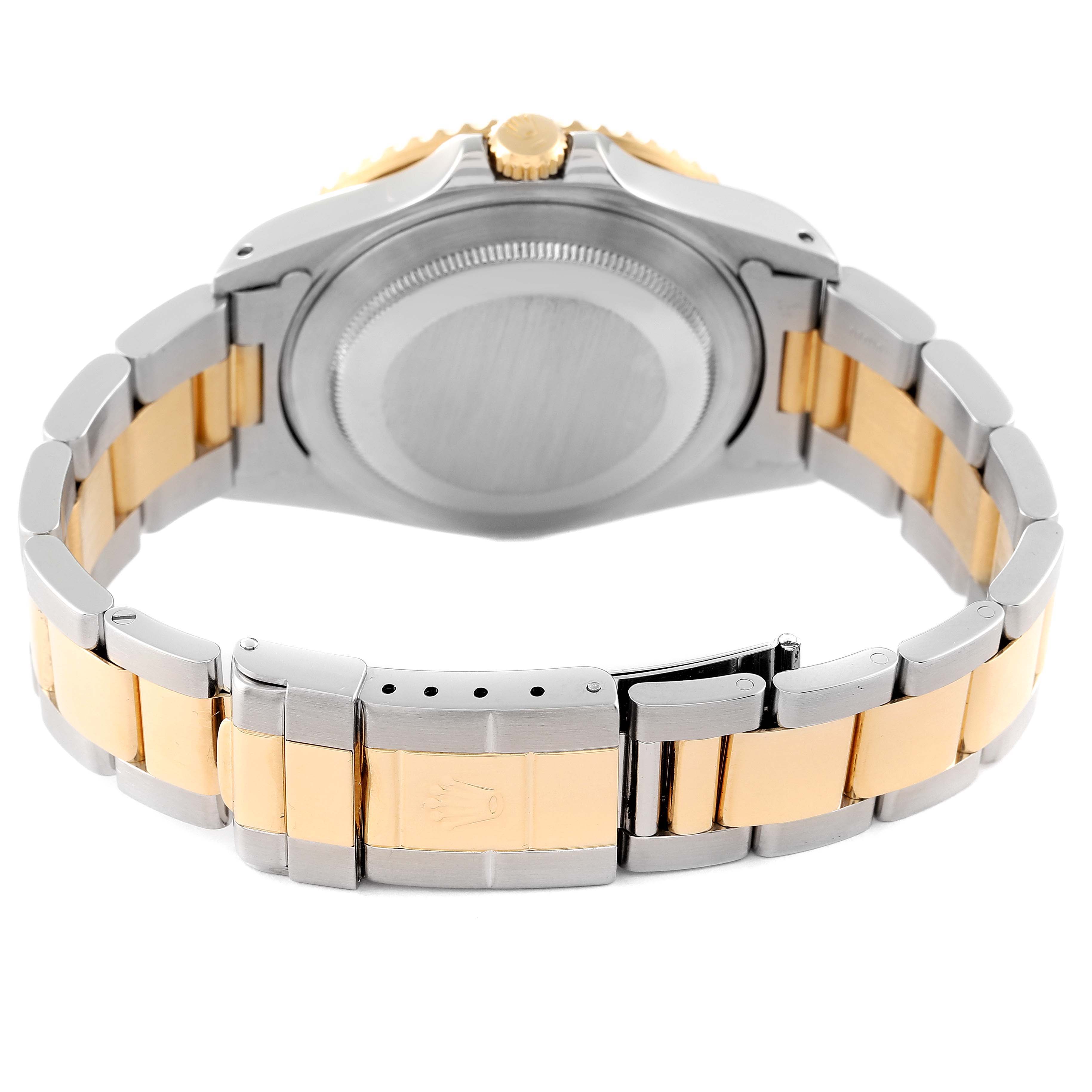 This image shows the back case and bracelet of a Rolex GMT-Master 16713 Men's Steel and Gold (two tone) Grey Dial 16713 Men's Steel and Gold (two tone) Grey Dial watch, emphasizing its two-tone metal design.