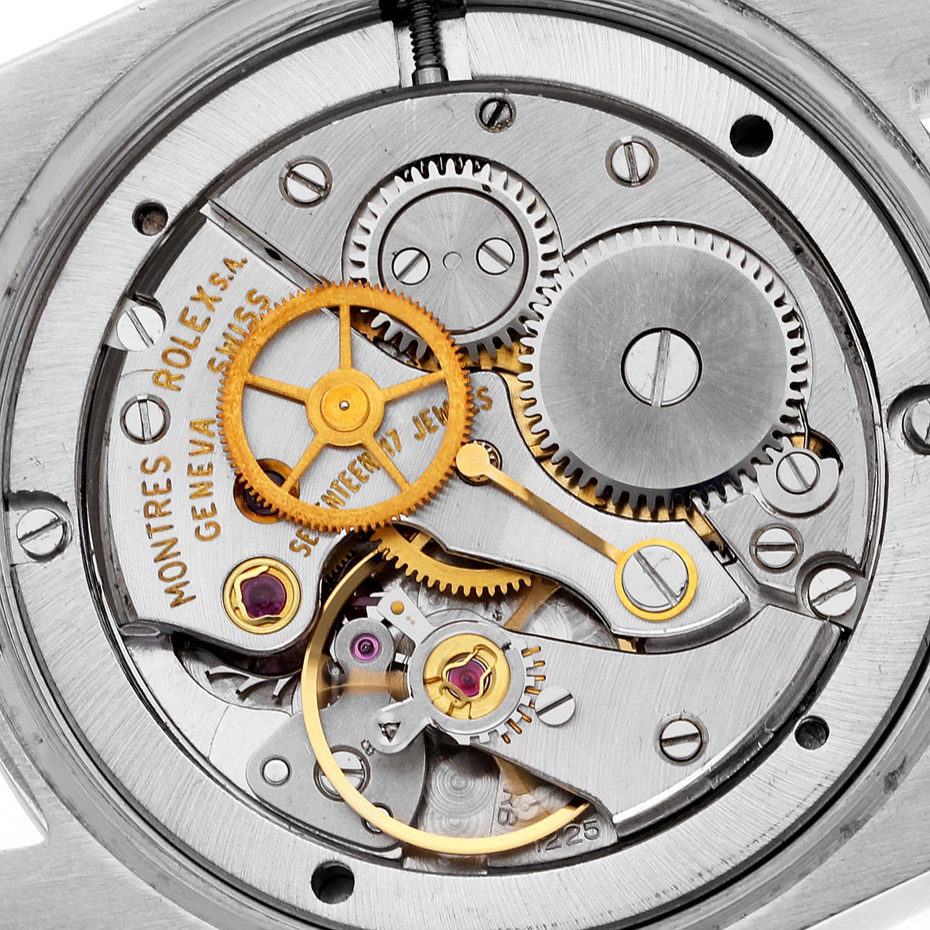 This image shows the intricate internal mechanism of a Rolex Vintage Collection 6694 Men's Stainless Steel Silver Dial 6694 Men's Stainless Steel Silver Dial watch, featuring gears and jewels.