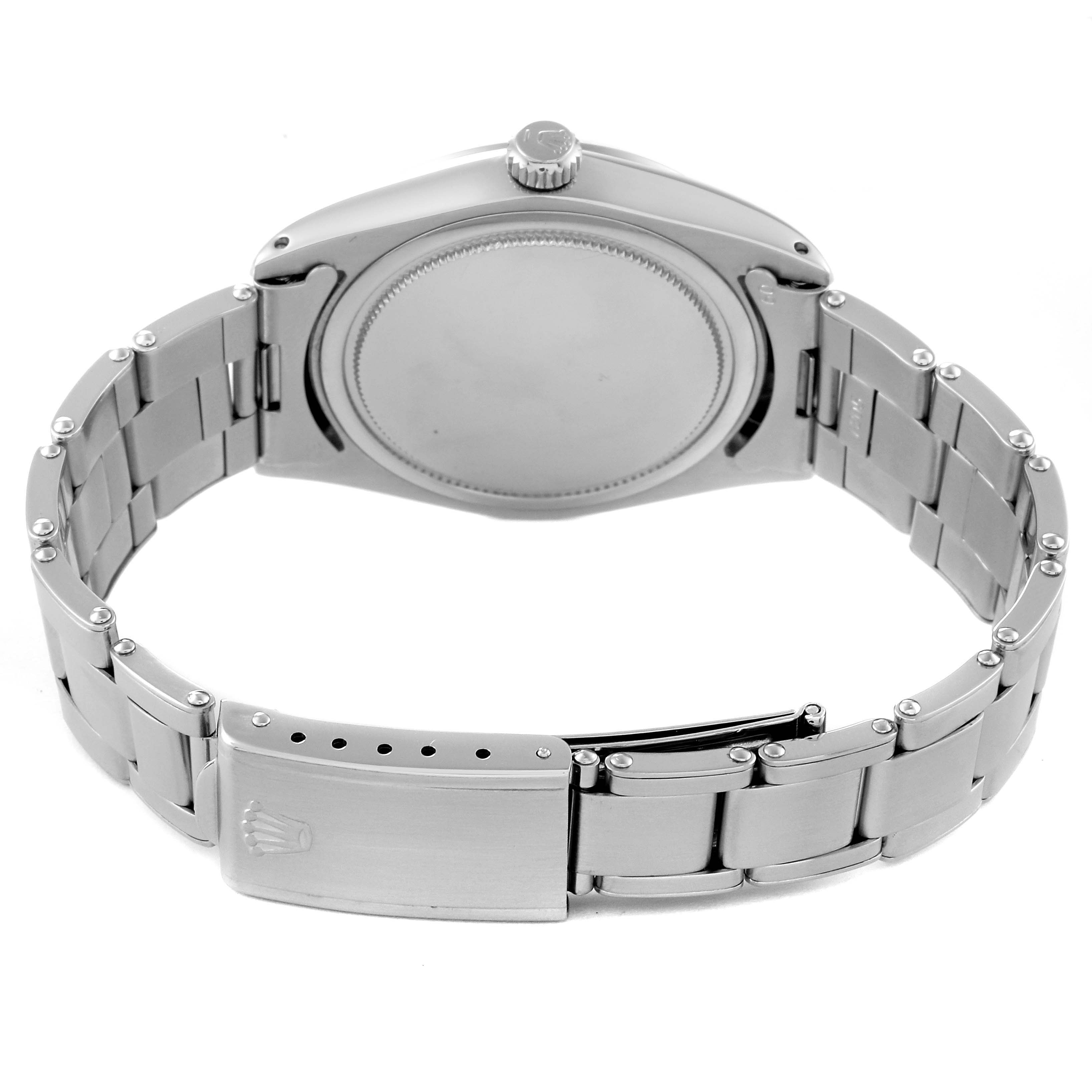 The image shows the back and bracelet of a Rolex Vintage Collection 6694 Men's Stainless Steel Silver Dial 6694 Men's Stainless Steel Silver Dial watch, highlighting its clasp and crown.