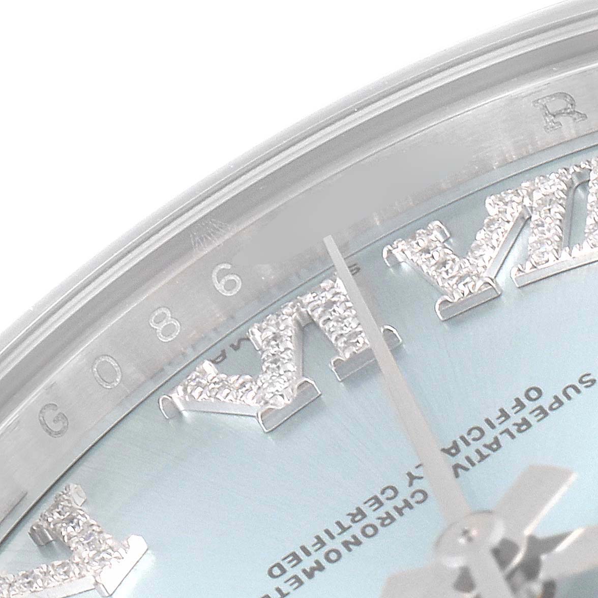 The image shows a close-up angle of the dial and part of the crystal of a Rolex President 218206 Men's Platinum Blue Dial 218206 Men's Platinum Blue Dial model watch, highlighting the Roman numeral markers.