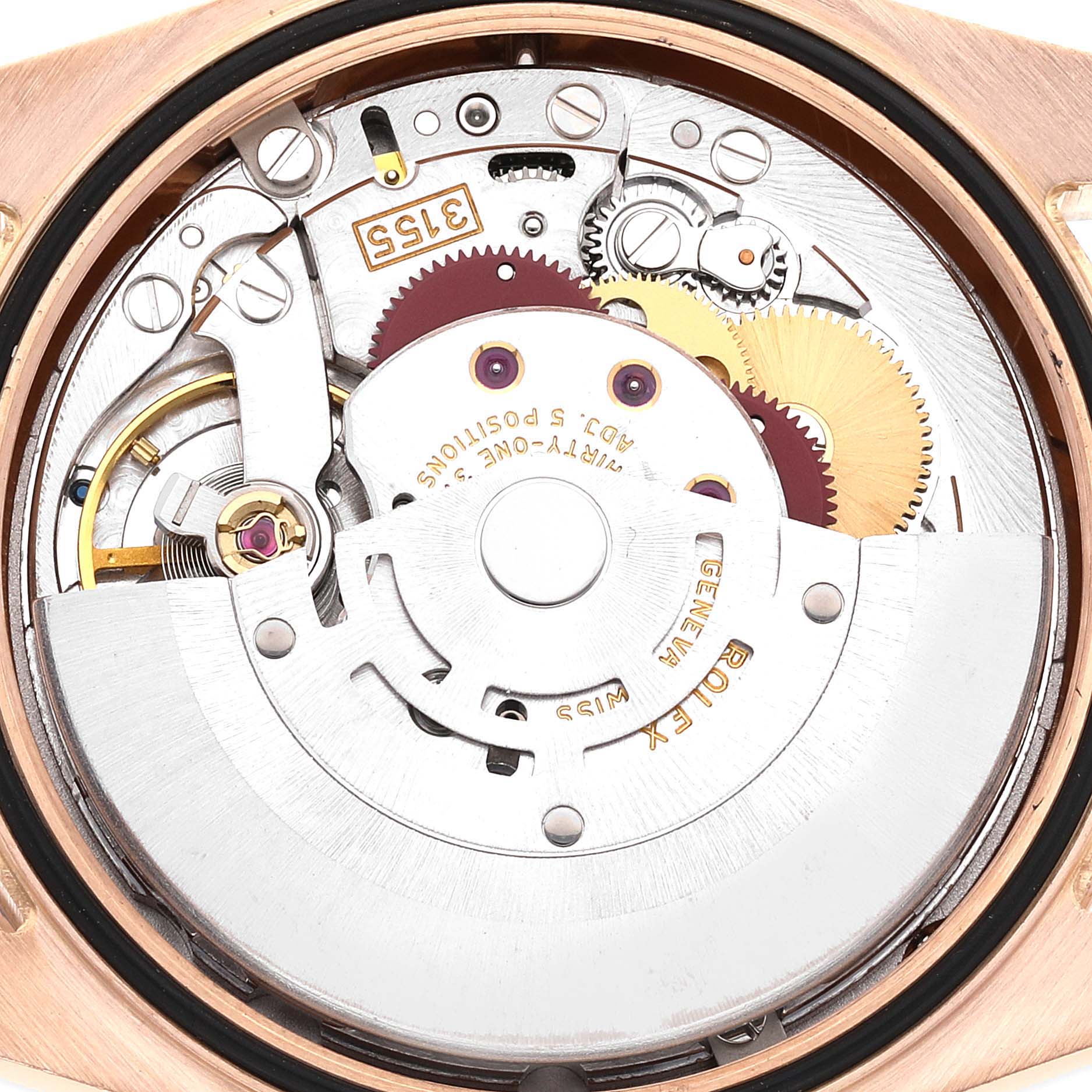 The image shows the intricate internal mechanical movement of a Rolex President 118205 Men's Rose Gold Pink Dial 118205 Men's Rose Gold Pink Dial model watch, viewed from the back.