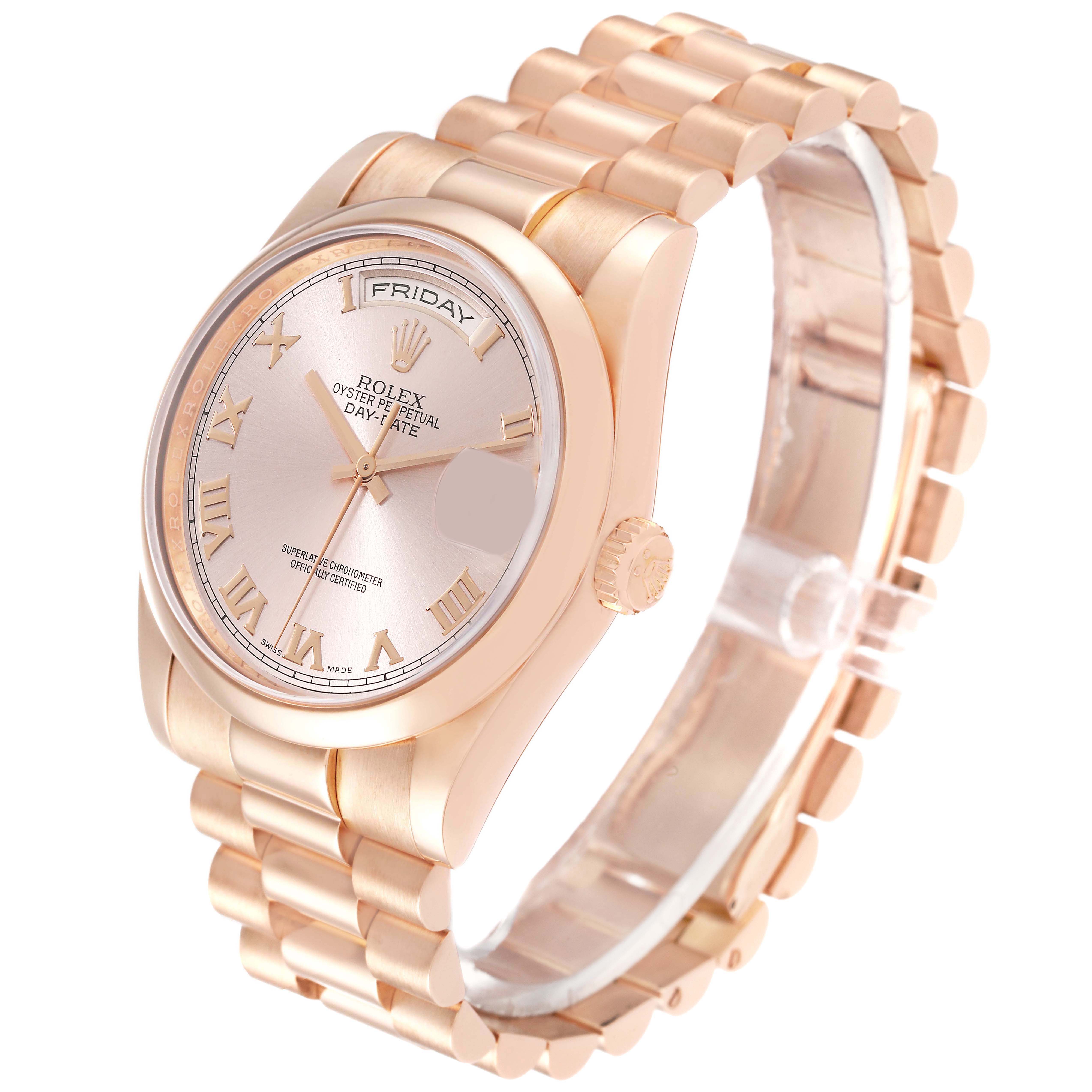 This Rolex President 118205 Men's Rose Gold Pink Dial 118205 Men's Rose Gold Pink Dial model is shown from an angled top-down view, displaying the dial, bezel, case, and bracelet.