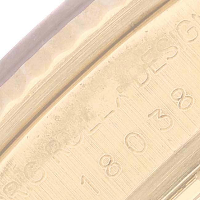 The close-up image shows the engraved edge of the case back or inner part of a Rolex President 18038 Men's Yellow Gold Champagne Dial 18038 Men's Yellow Gold Champagne Dial model watch.