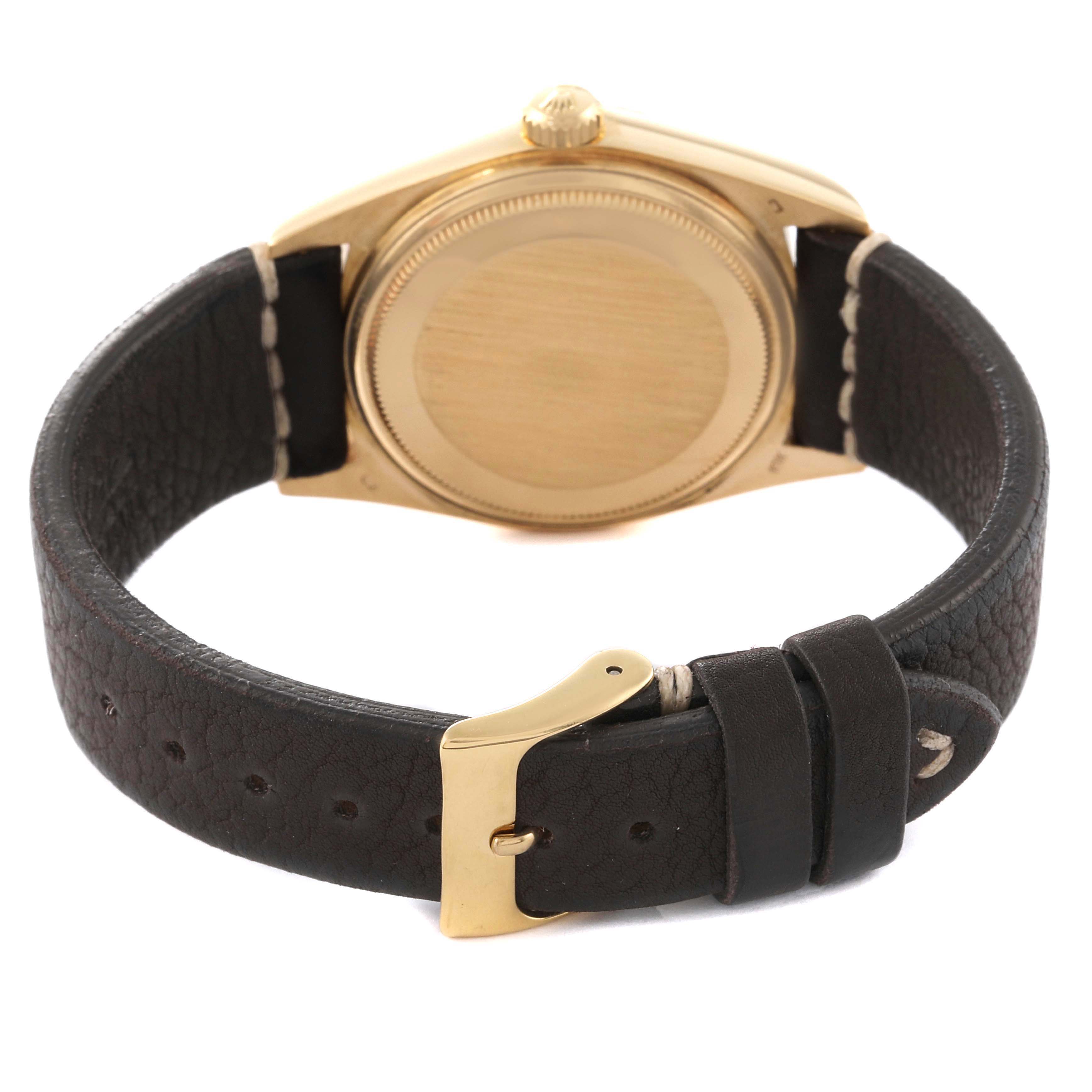 The image shows the back case and leather strap of a Rolex President 18038 Men's Yellow Gold Champagne Dial 18038 Men's Yellow Gold Champagne Dial model watch.