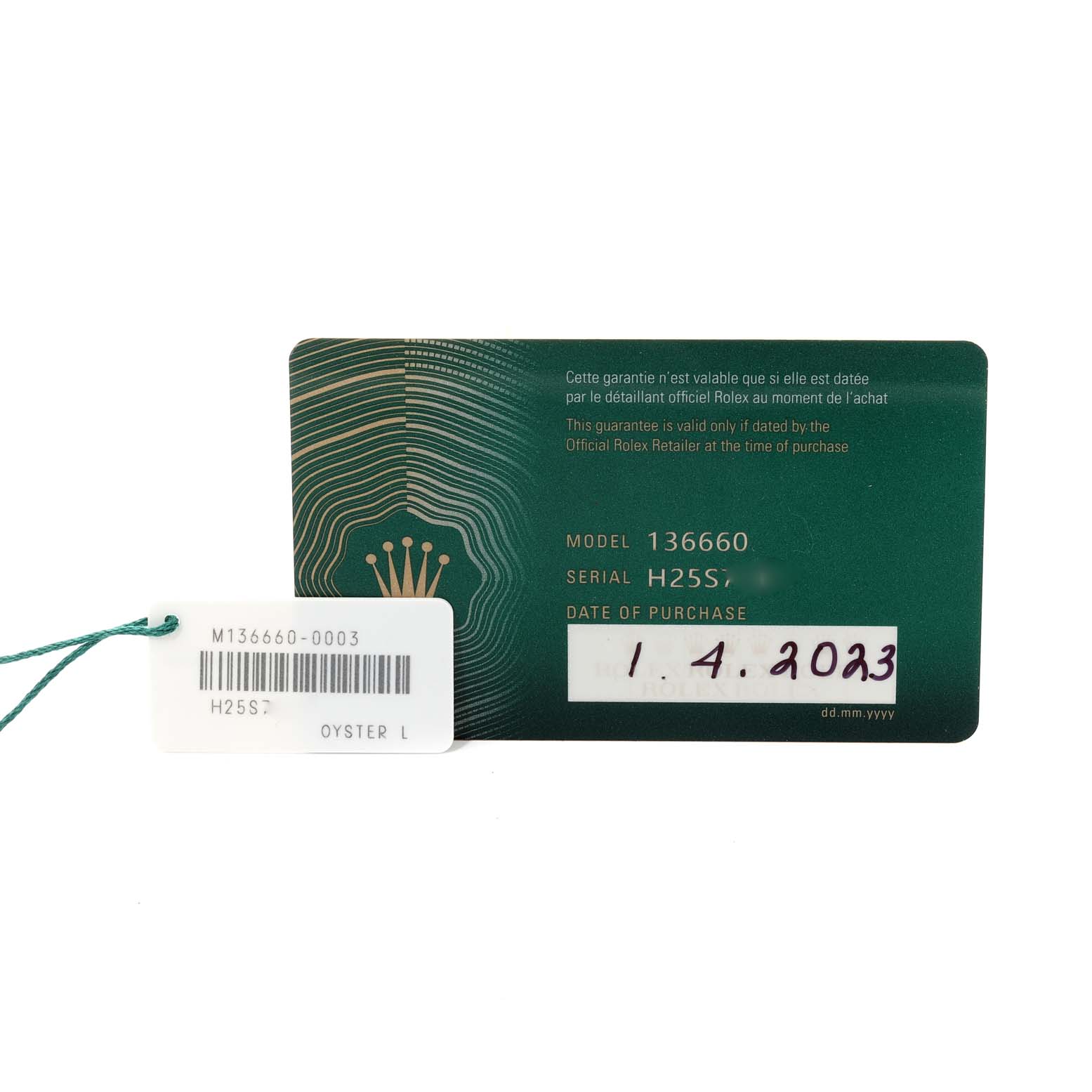 The image shows a warranty card and a tag for the Rolex Sea-Dweller 136660 Men's Stainless Steel Blue Dial 136660 Men's Stainless Steel Blue Dial model 136660.