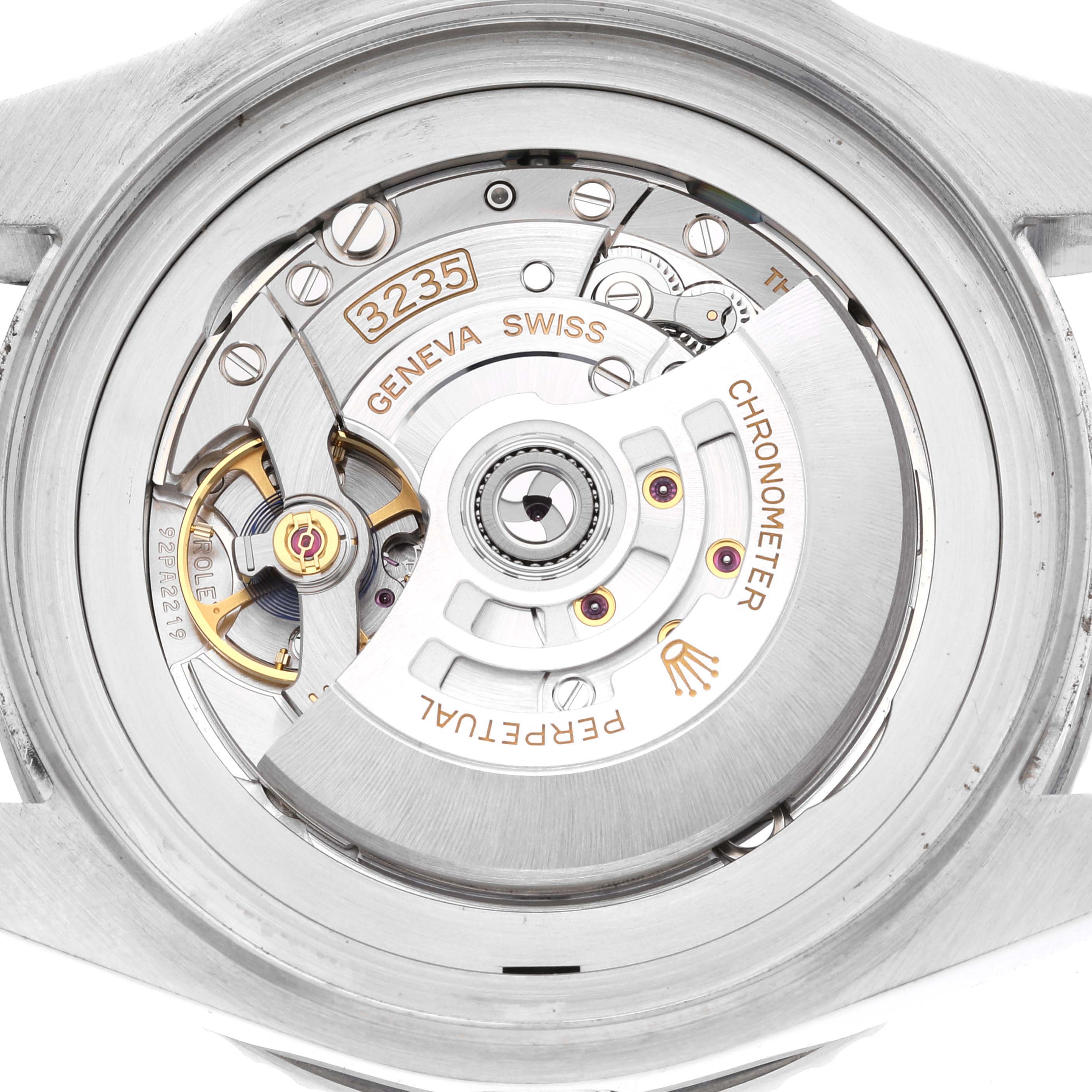 The image shows a close-up view of the movement mechanism of a Rolex Sea-Dweller 136660 Men's Stainless Steel Blue Dial 136660 Men's Stainless Steel Blue Dial model, highlighting the chronometer and rotor components.