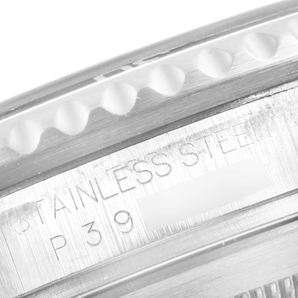 This close-up image shows the side of a Rolex Submariner 16610 Men's Stainless Steel Black Dial 16610 Men's Stainless Steel Black Dial watch case, highlighting the stainless steel build and serial number.