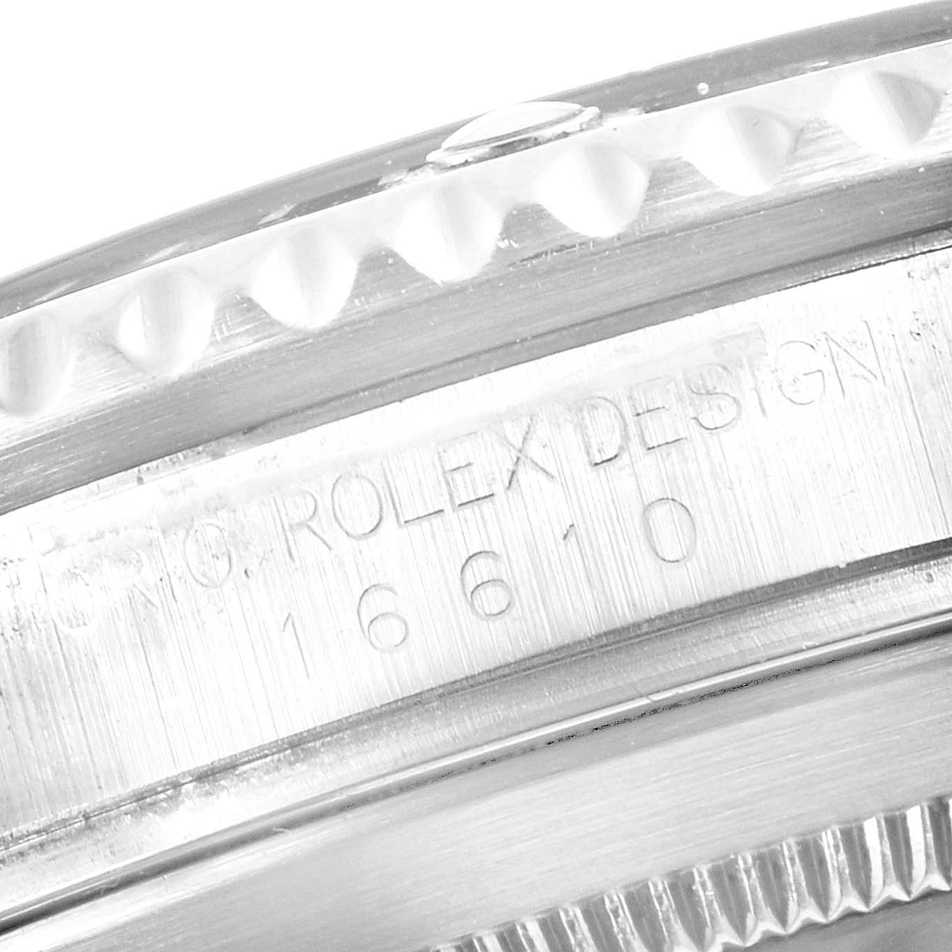 This is a close-up of the side of a Rolex Submariner 16610 Men's Stainless Steel Black Dial 16610 Men's Stainless Steel Black Dial watch, showing the model number 16610 engraved.