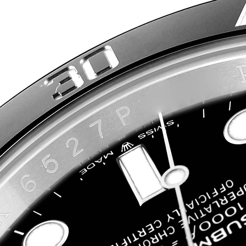 This close-up image shows the face, bezel at the 30-marker, and part of the dial of a Rolex Submariner 124060 Men
s Stainless Steel Black Dial 124060 Men
s Stainless Steel Black Dial watch.