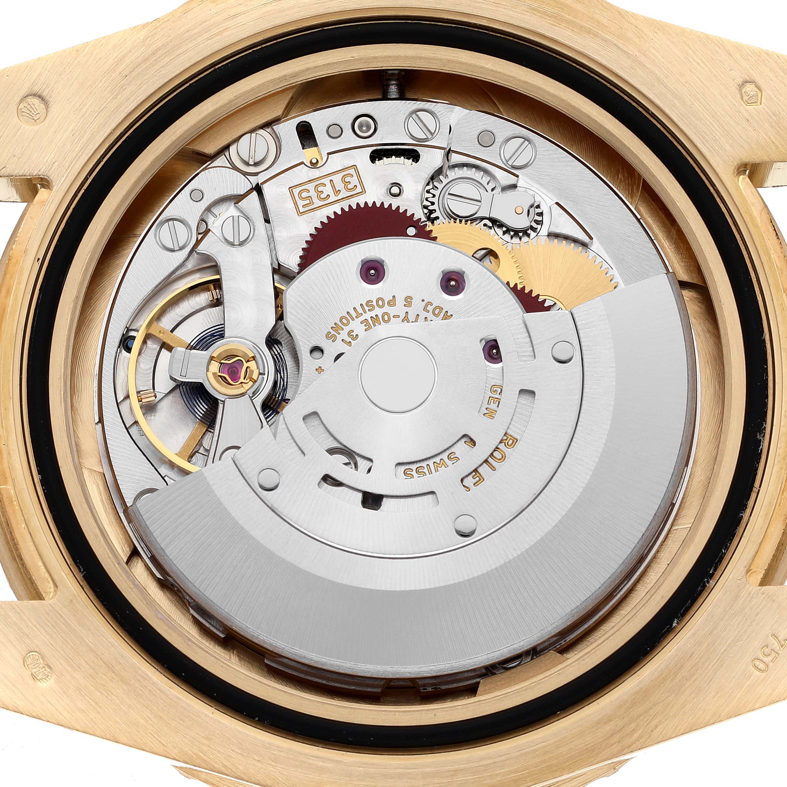 This image shows an overhead view of the internal mechanism of a Rolex Submariner 116618LB Men's Yellow Gold Blue Dial 116618LB Men's Yellow Gold Blue Dial watch, featuring gears and the rotor.