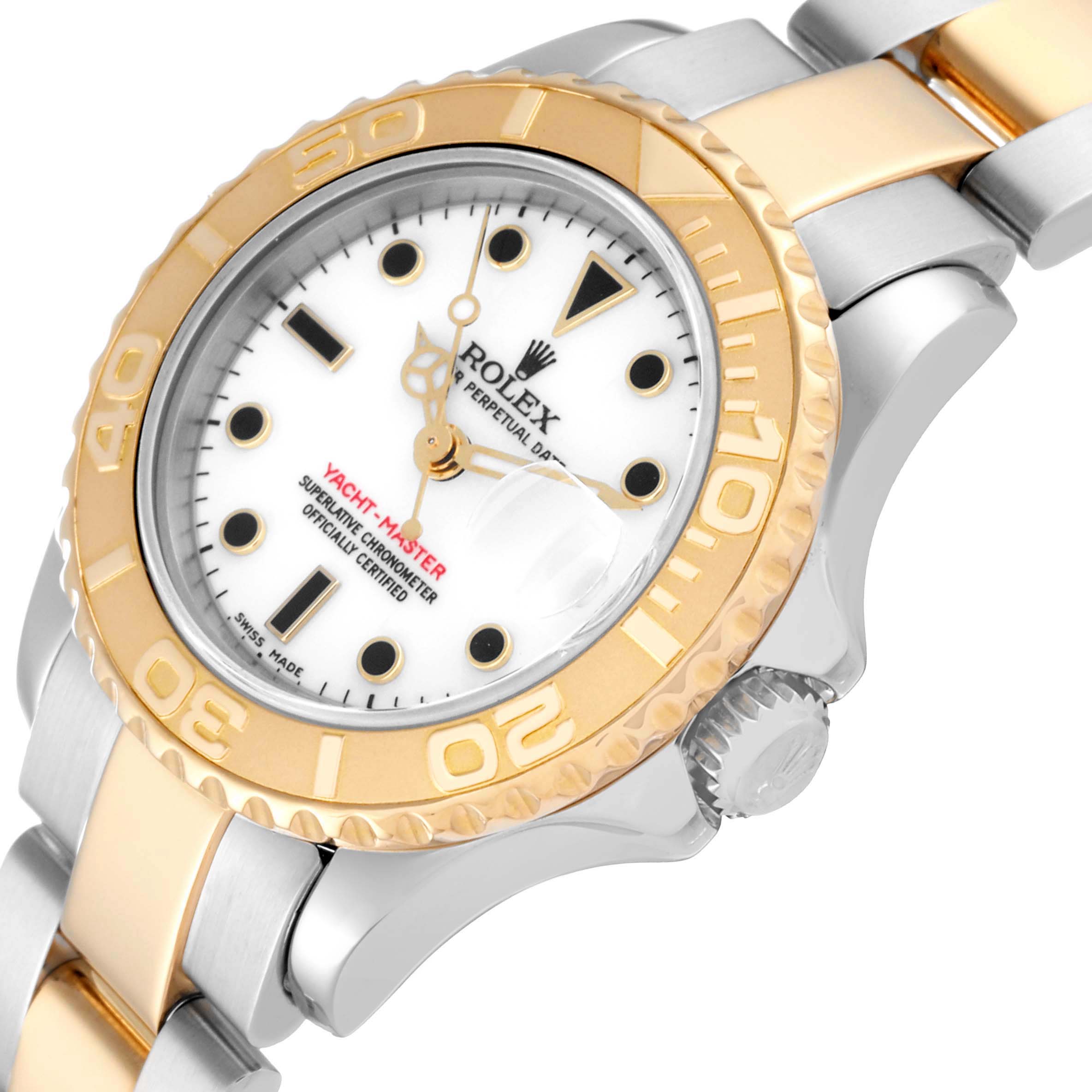 The image displays a Rolex Yacht-Master 169623 Women's Steel and Gold (two tone) White Dial 169623 Women's Steel and Gold (two tone) White Dial watch at an angled close-up, showing the dial, bezel, and a portion of the bracelet.