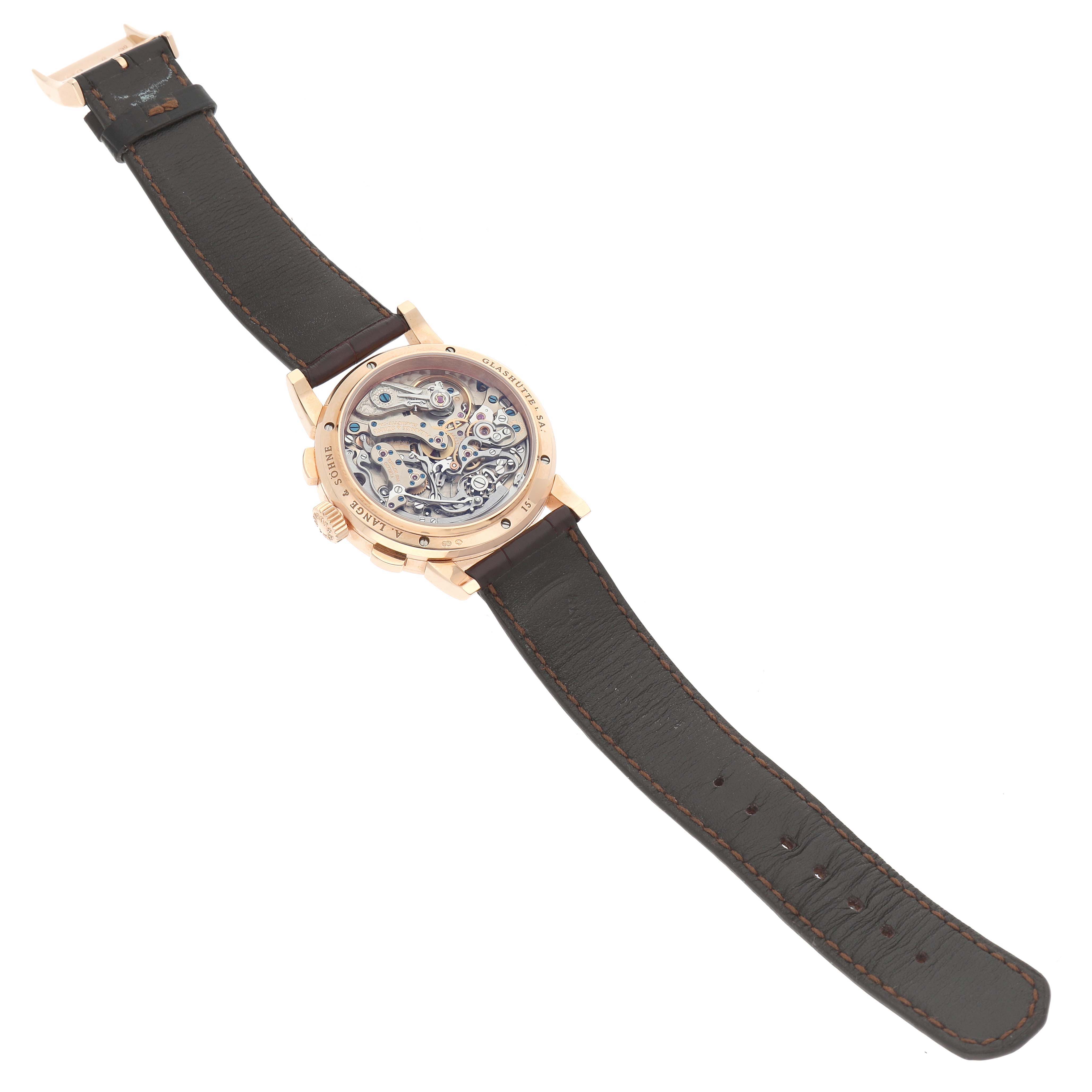 The image shows the back of the A. Lange & Sohne Datograph 403.032 Men's Rose Gold Silver Dial, highlighting the intricate movement and leather strap.