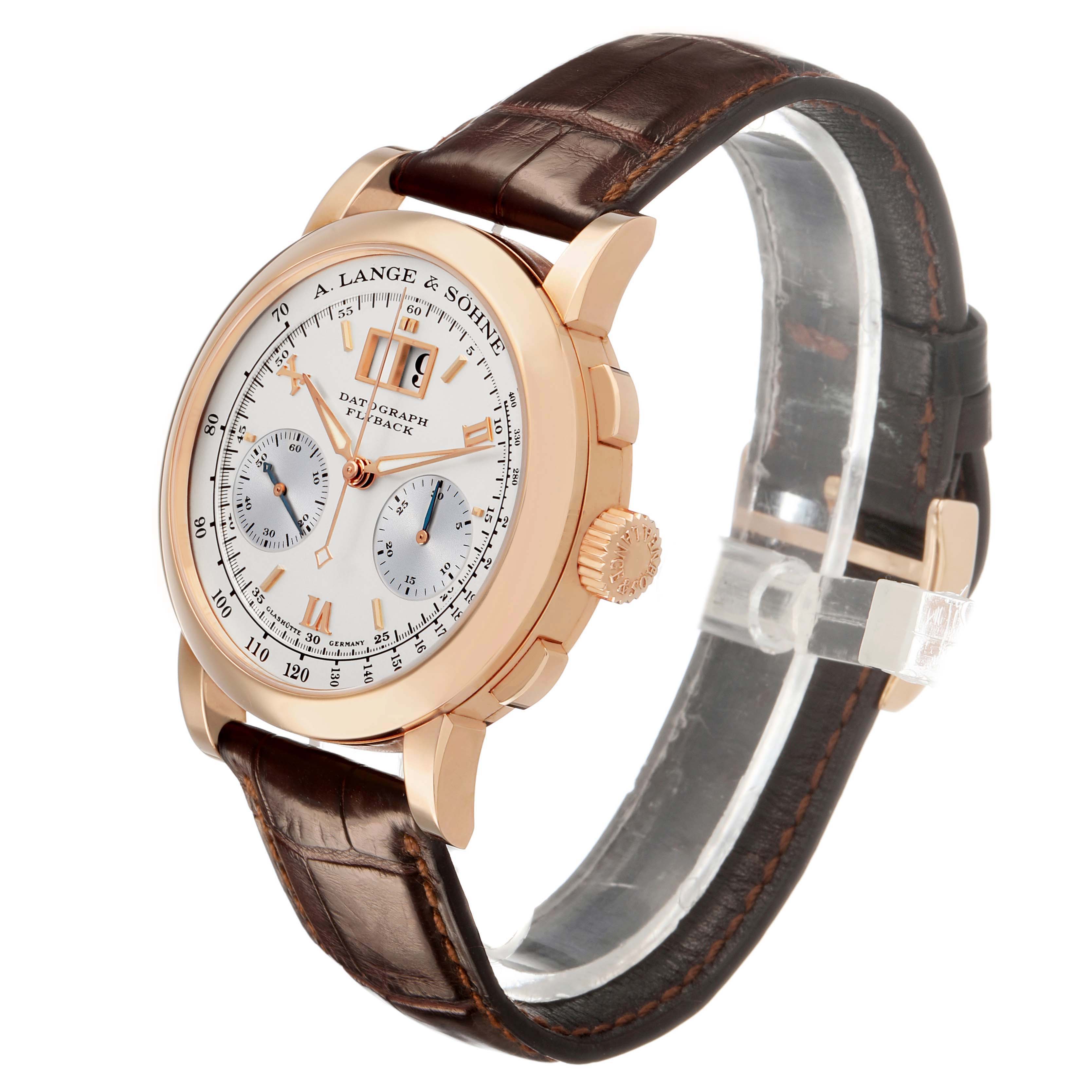 The A. Lange & Sohne Datograph 403.032 Men's Rose Gold Silver Dial watch is shown at a slight angle, highlighting the dial, crown, and leather strap.