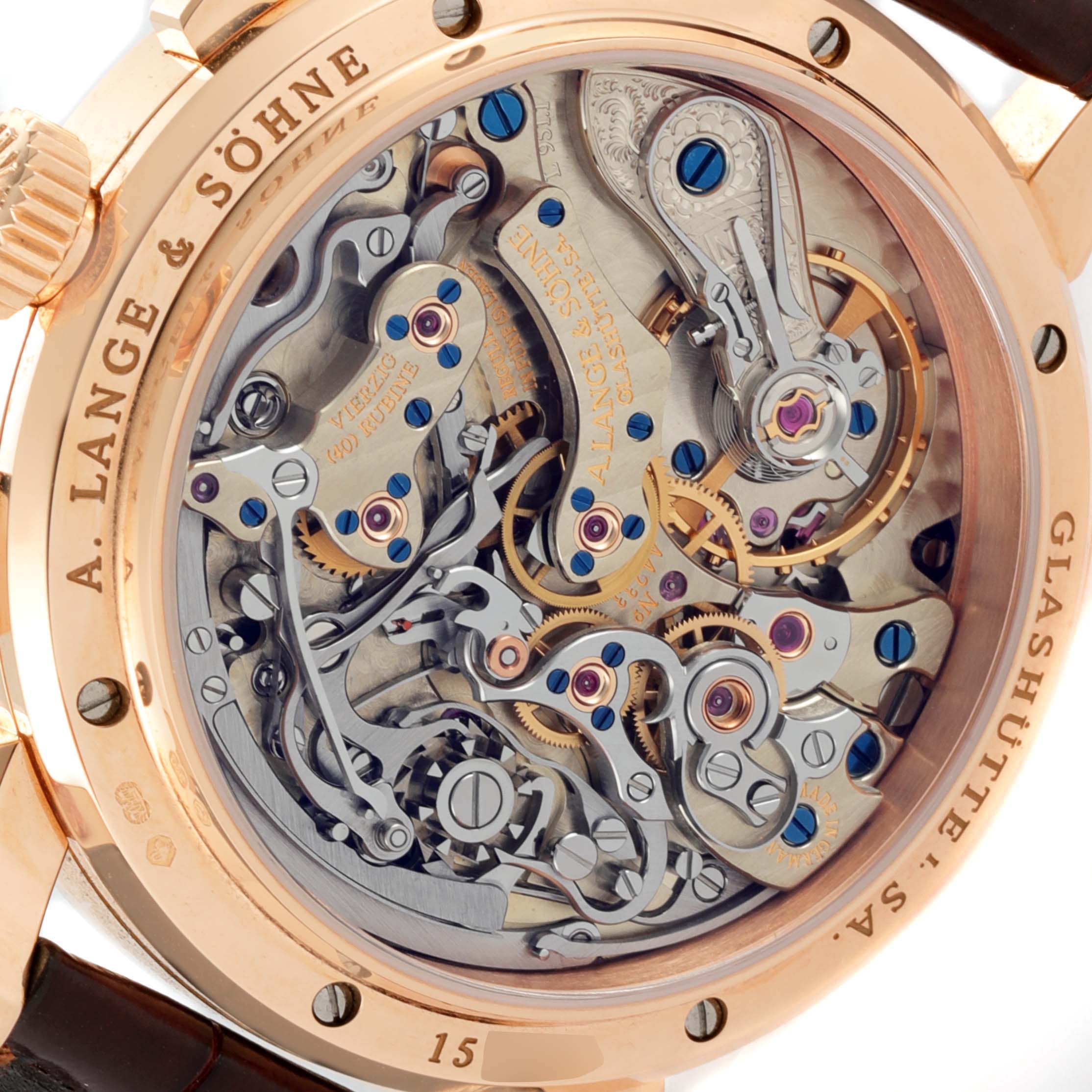 The image shows the intricate back view of the A. Lange & Sohne Datograph 403.032 Men's Rose Gold Silver Dial watch, highlighting its complex movement.