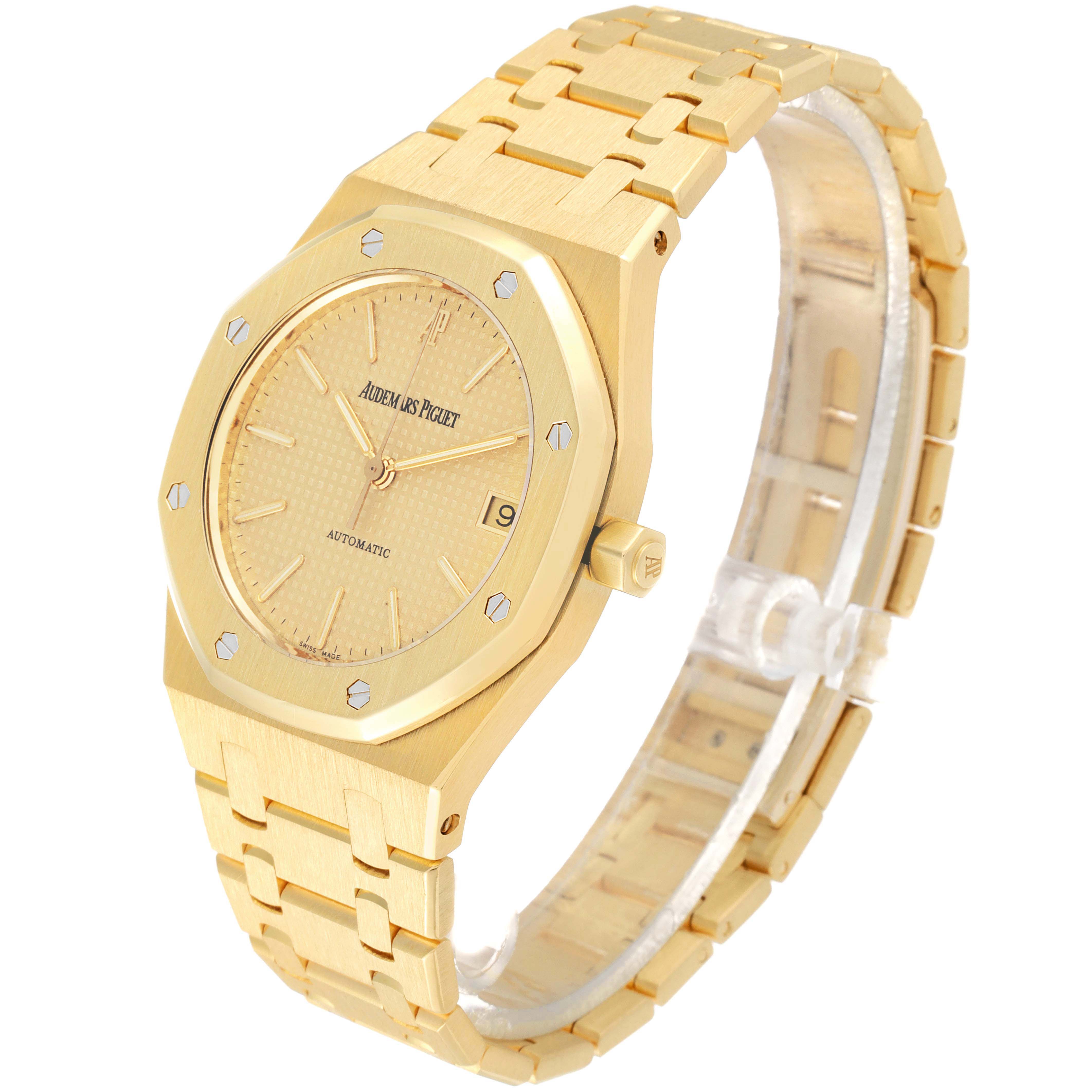 This image shows a side and top angle of the Audemars Piguet Royal Oak 14790BA Men's Yellow Gold Champagne Dial 14790BA Men's Yellow Gold Champagne Dial watch, highlighting its gold-tone case, bracelet, and dial.