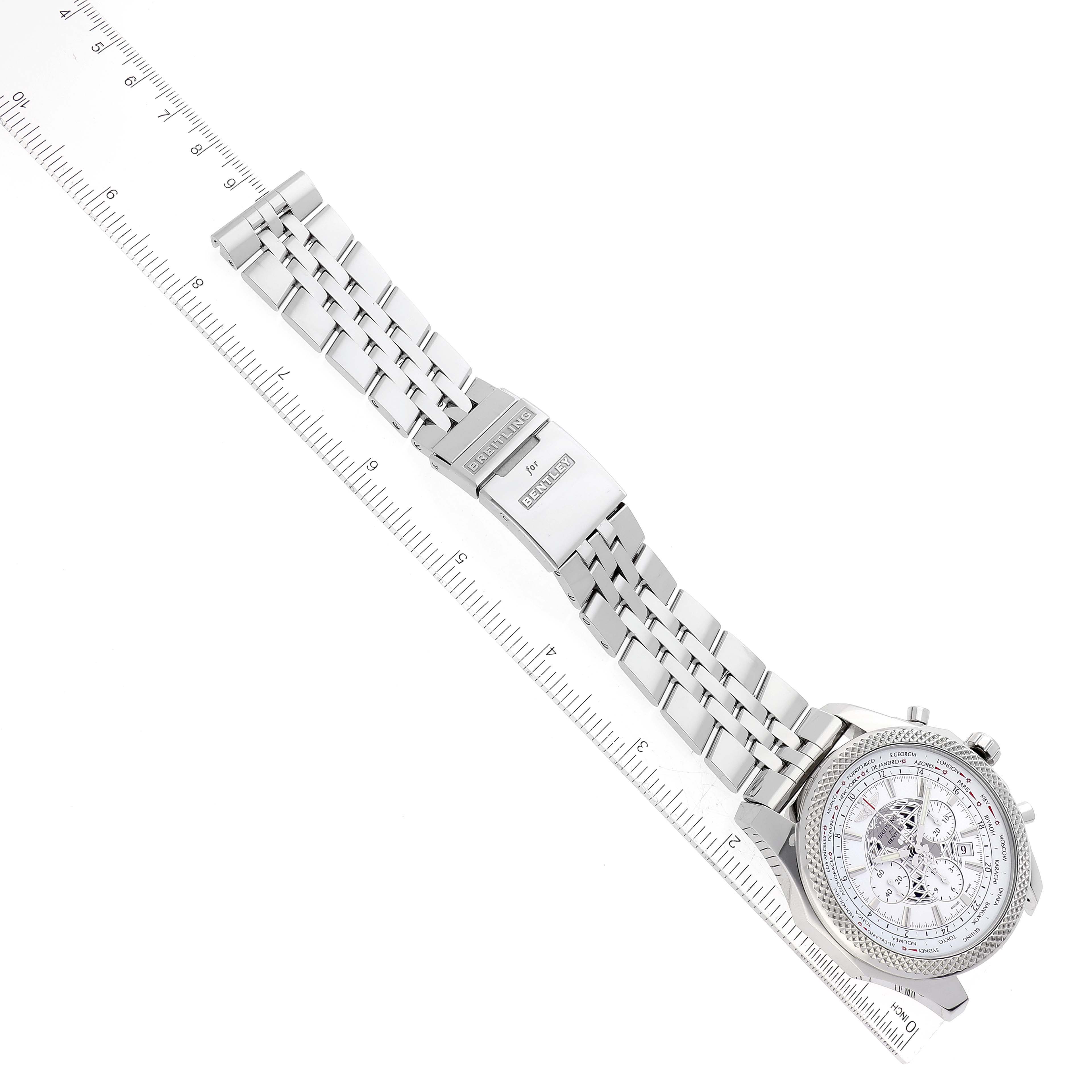 The image shows a top-down view of a Breitling Bentley AB0521 Men's Stainless Steel White Dial AB0521 Men's Stainless Steel White Dial watch, including the face and metal bracelet with a ruler for scale.