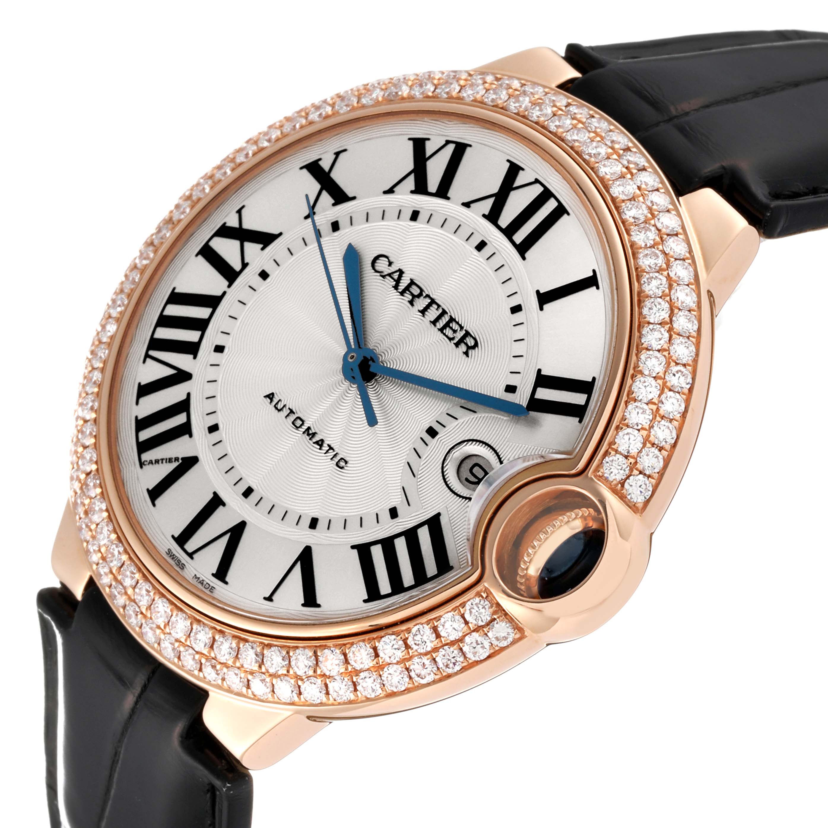 The Cartier Ballon Bleu WE900851 Men's Rose Gold Silver Dial WE900851 Men's Rose Gold Silver Dial watch is shown at an angled view, highlighting its diamond-studded bezel, roman numerals, and black strap.