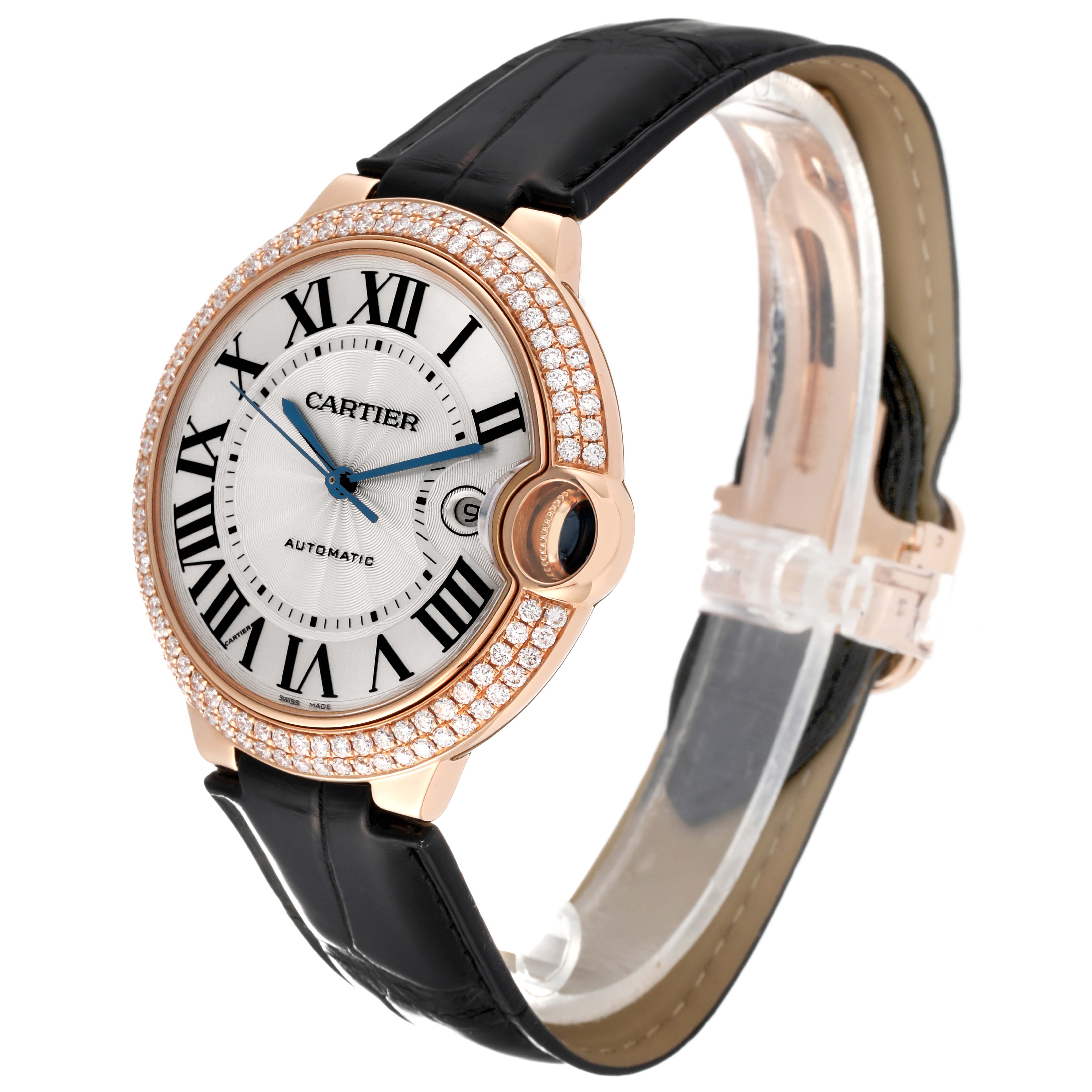 This image shows a Ballon Bleu de Cartier watch at an angled view, highlighting the Roman numeral dial, diamond-studded bezel, and black leather strap.