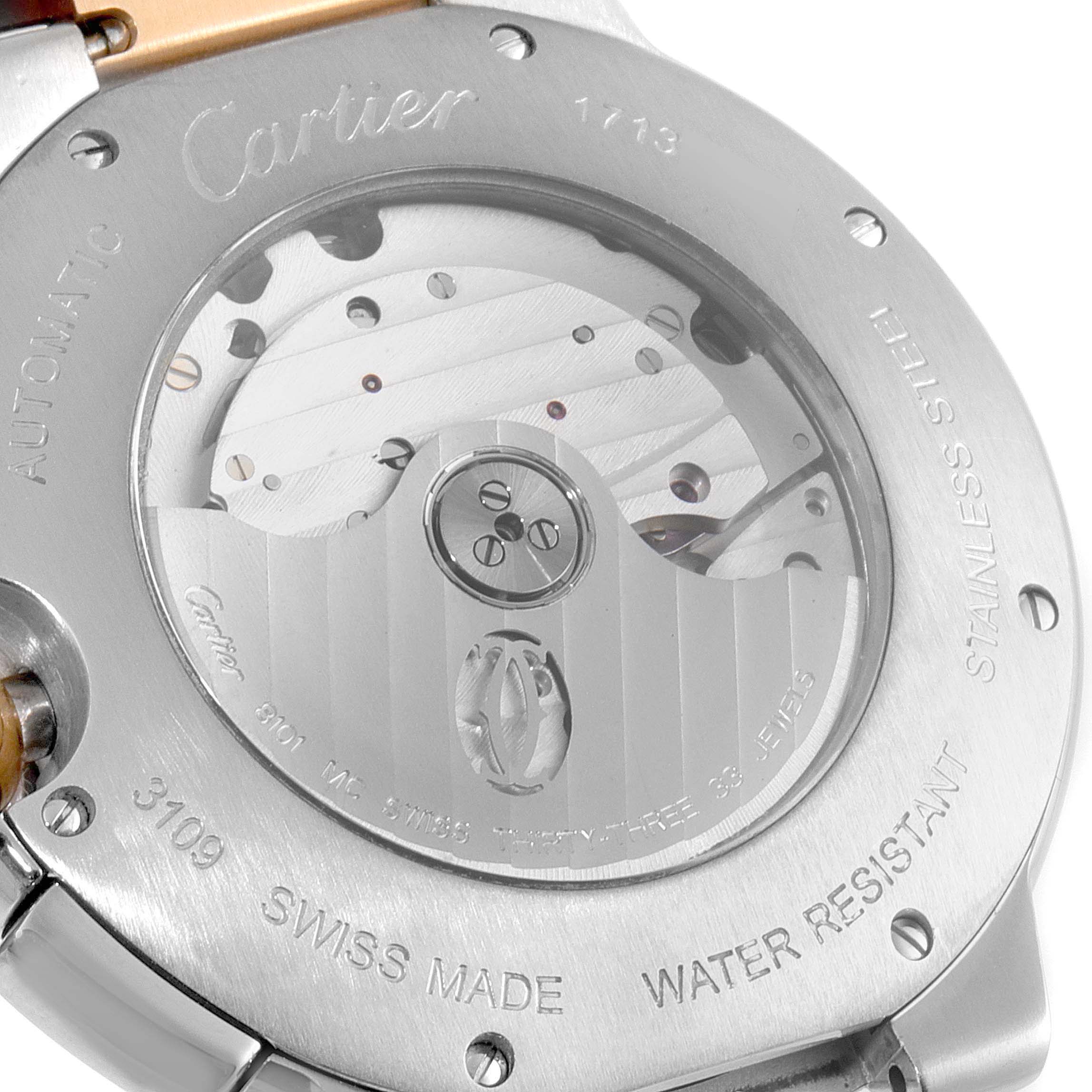 The image shows the back case of a Cartier Ballon Bleu W6920063 Men's Steel and Gold (two tone) Silver Dial W6920063 Men's Steel and Gold (two tone) Silver Dial watch, displaying its automatic movement and engraving details.