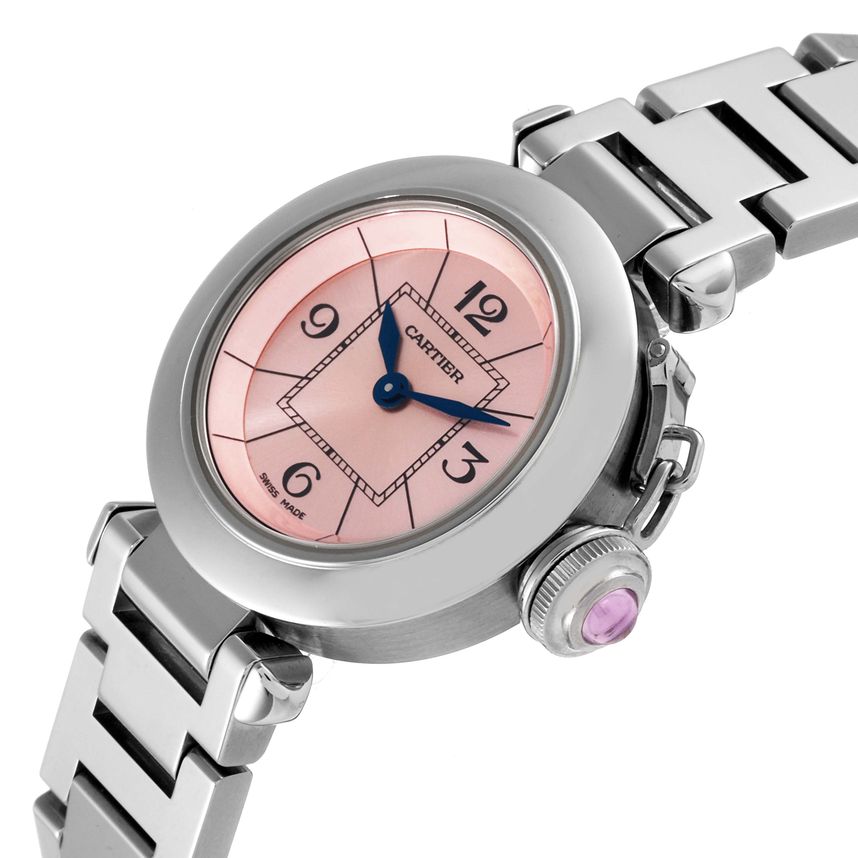 The image shows a close-up angle of a Cartier Pasha W3140008 Women's Stainless Steel Pink Dial W3140008 Women's Stainless Steel Pink Dial watch, highlighting its pink dial, blue hands, and metal bracelet.