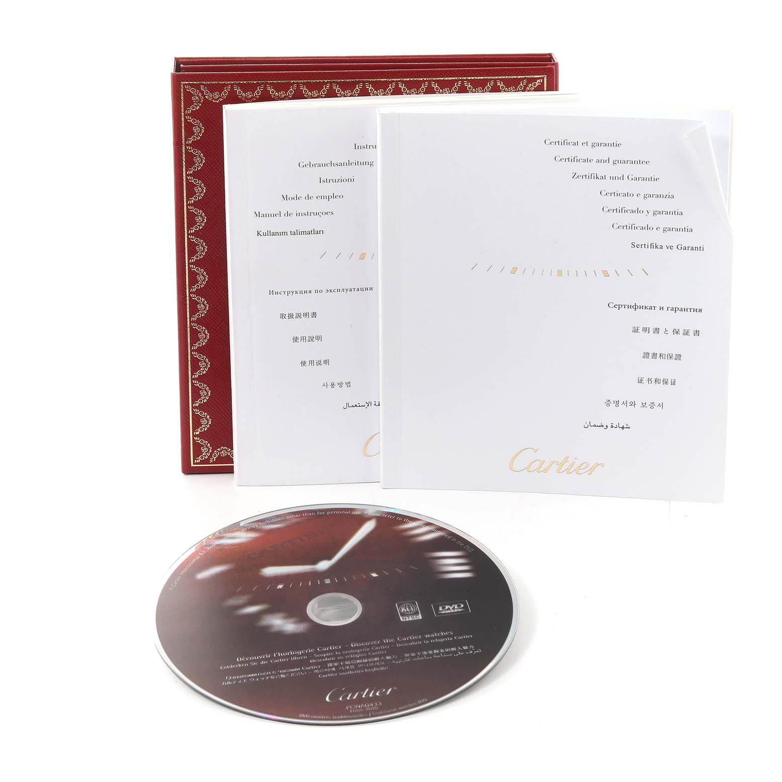 The image shows the instruction manual, certificate, and a CD for the Roadster model by Cartier.