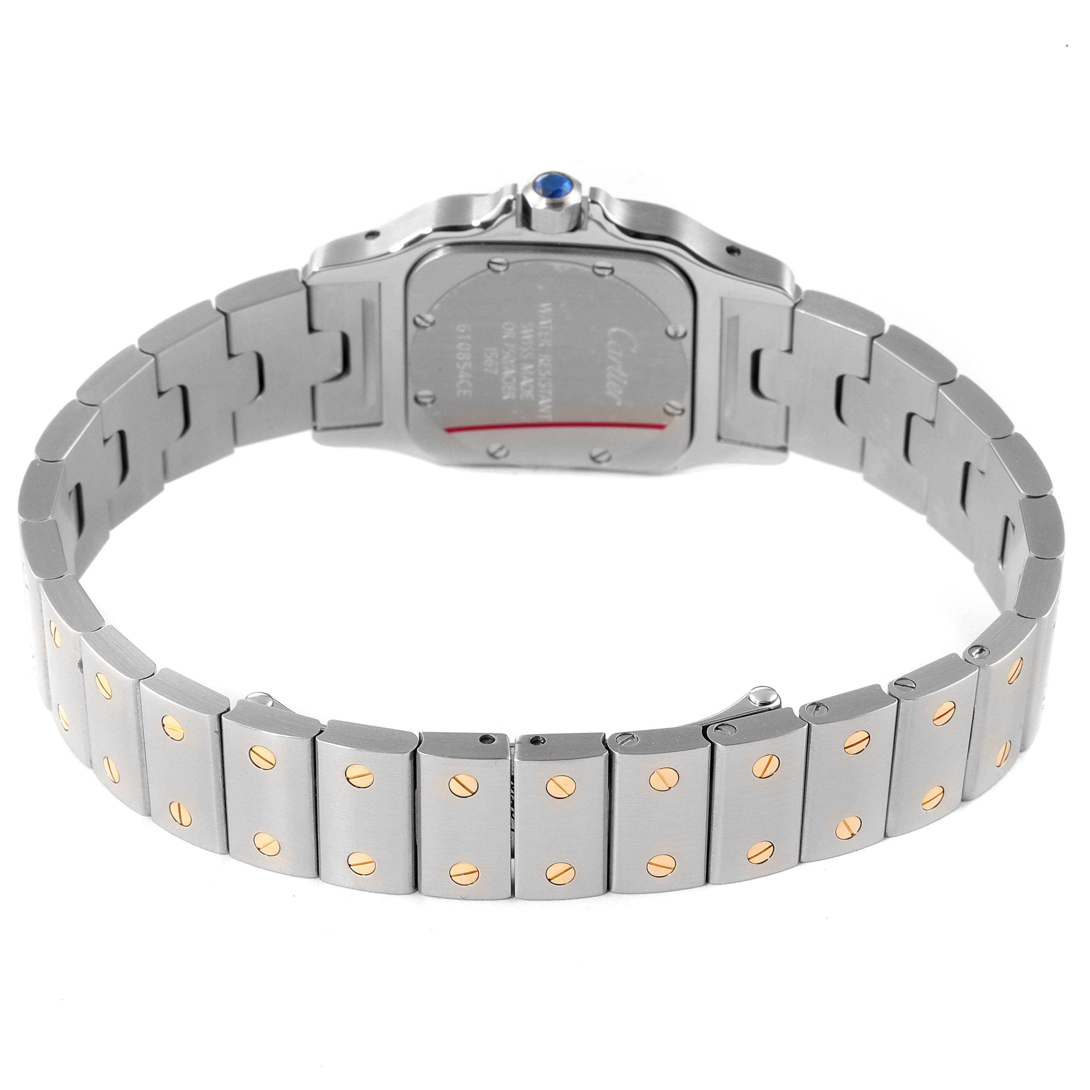 The image shows the back and bracelet of a Cartier Santos W20012C4 Women's Steel and Gold (two tone) Silver Dial W20012C4 Women's Steel and Gold (two tone) Silver Dial watch, featuring a stainless steel case and a metal band with gold screws.
