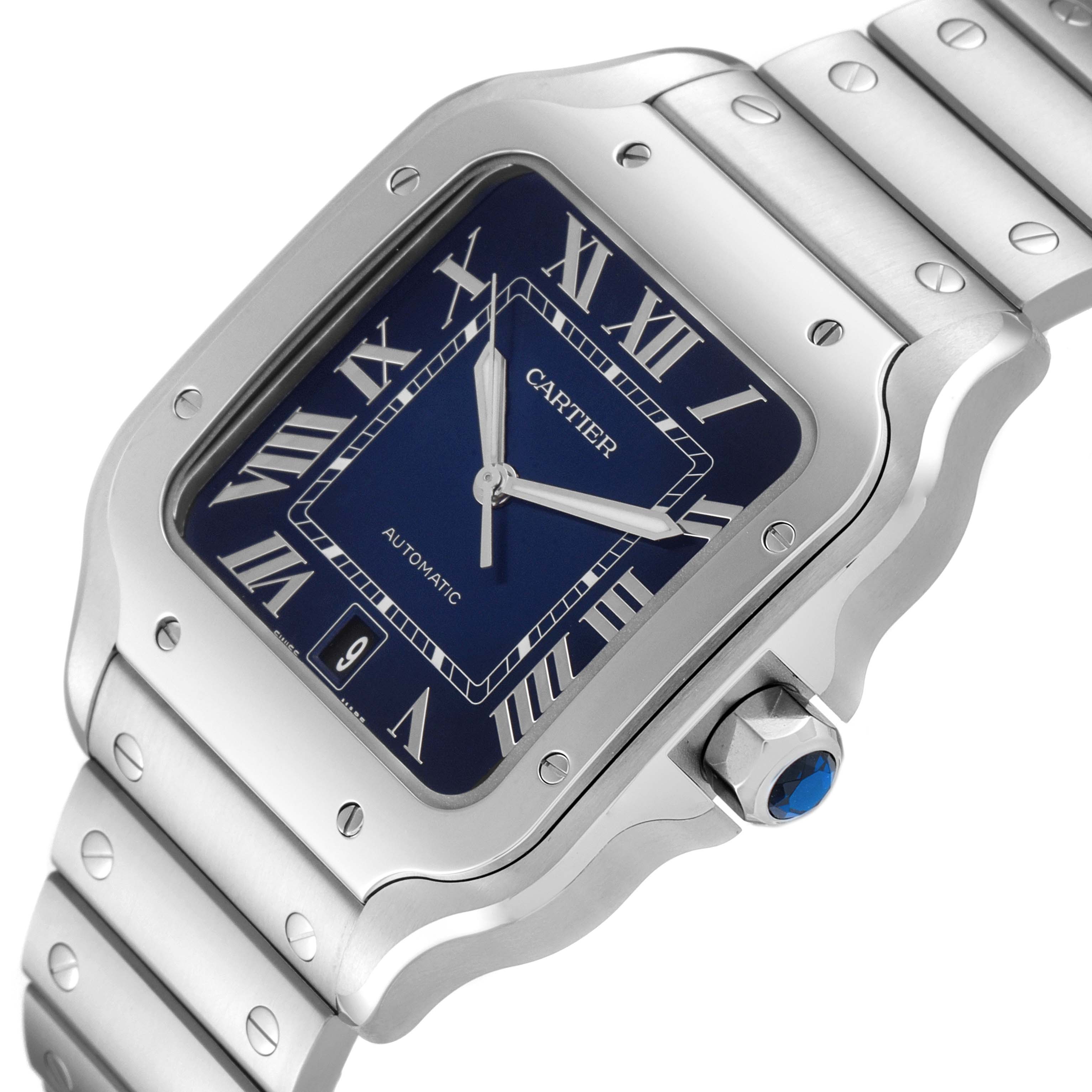 This image shows a close-up angle of a Cartier Santos WSSA0030 Men
s Stainless Steel Blue Dial WSSA0030 Men
s Stainless Steel Blue Dial watch, highlighting its face, bezel, and part of the bracelet.