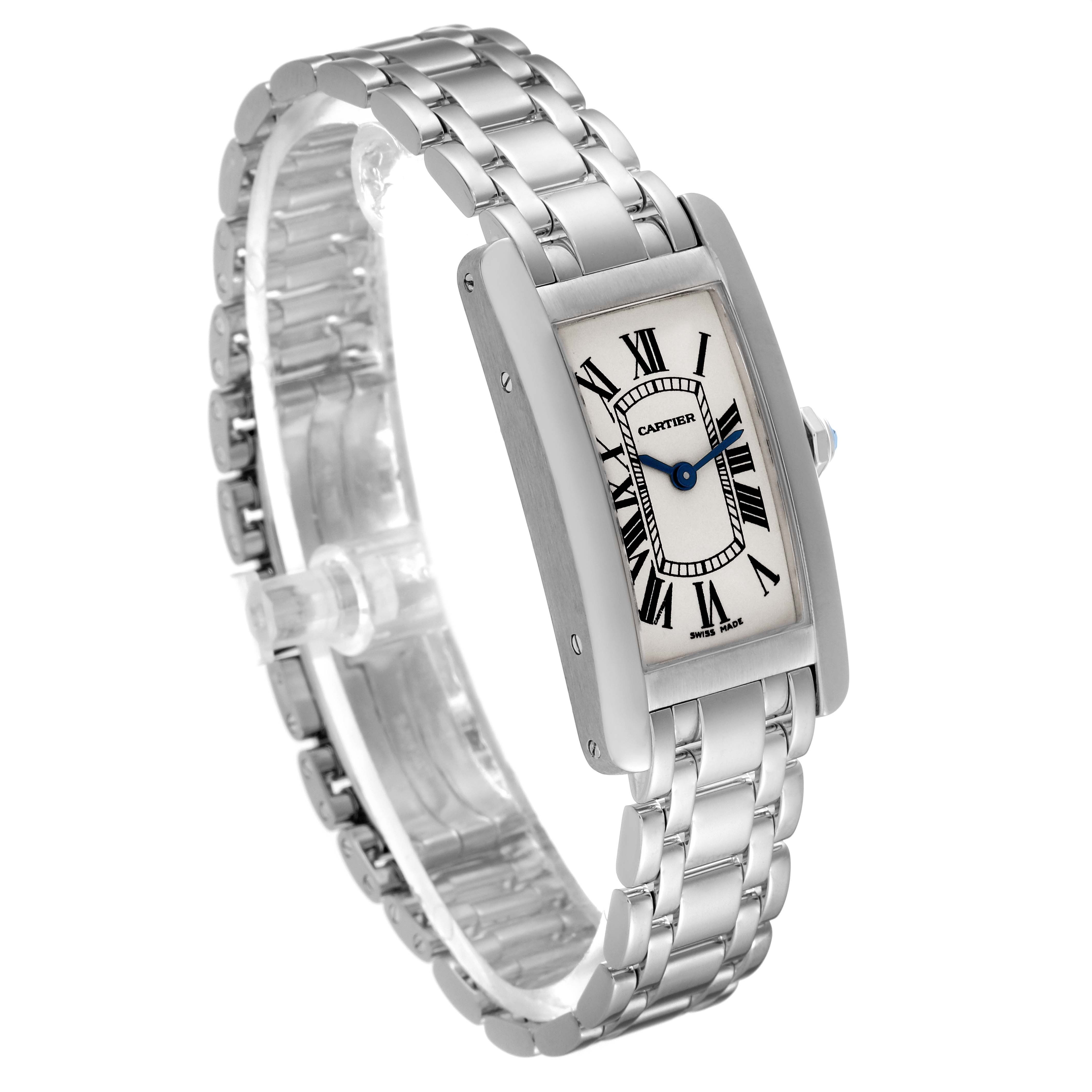 The image shows a Cartier Tank Americaine W26019L1 Women
s White Gold Silver Dial W26019L1 Women
s White Gold Silver Dial watch at a three-quarter angle, highlighting its bracelet and rectangular face.