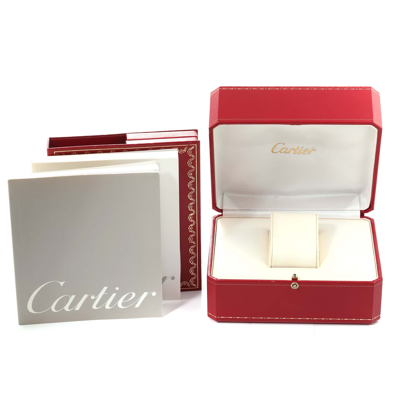 This image shows the packaging and manuals for the Cartier Tank Americaine W26019L1 Women
s White Gold Silver Dial W26019L1 Women
s White Gold Silver Dial model, including the red box and a booklet.