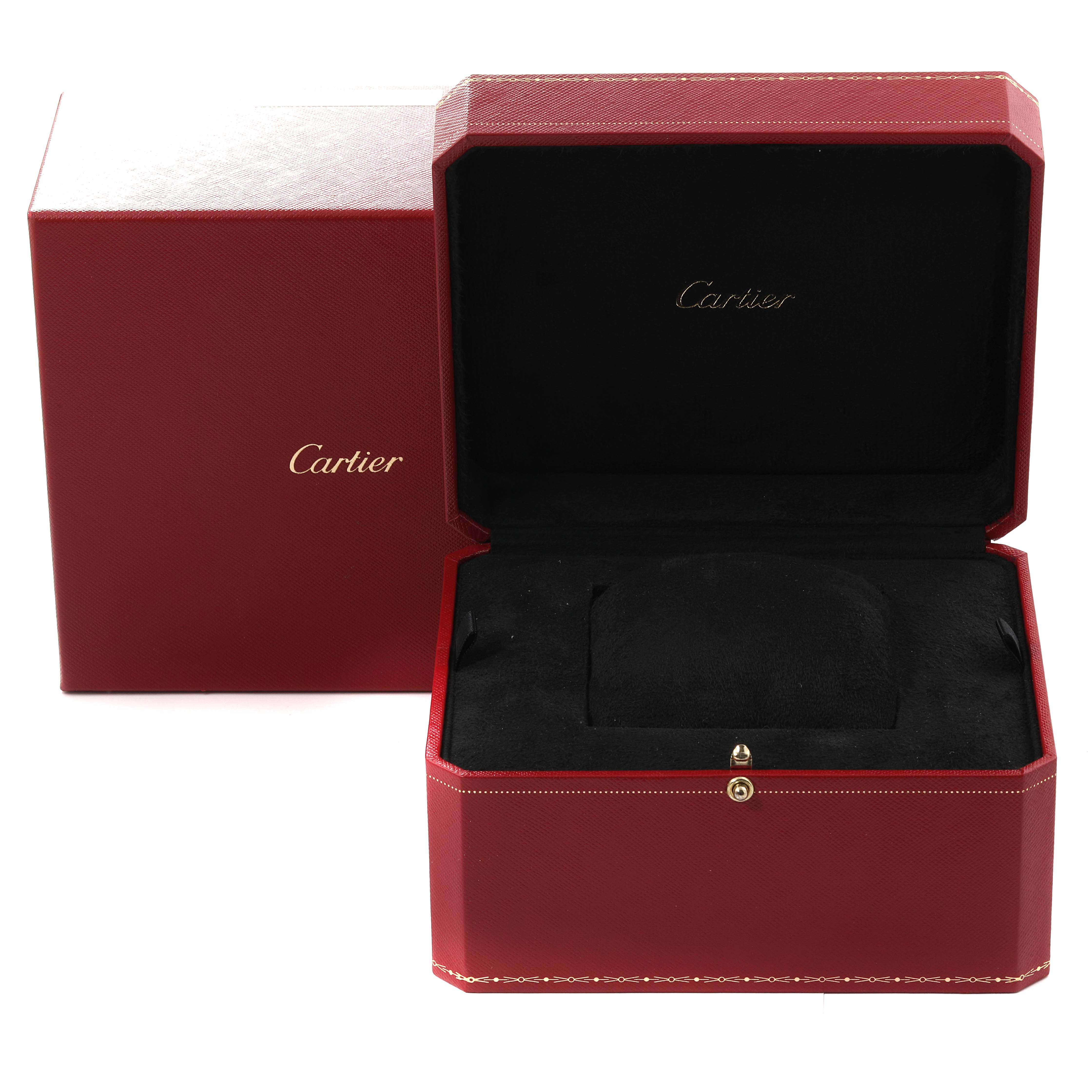 The image shows an open red Cartier watch box for the Tank Americaine model, angled slightly from the front.