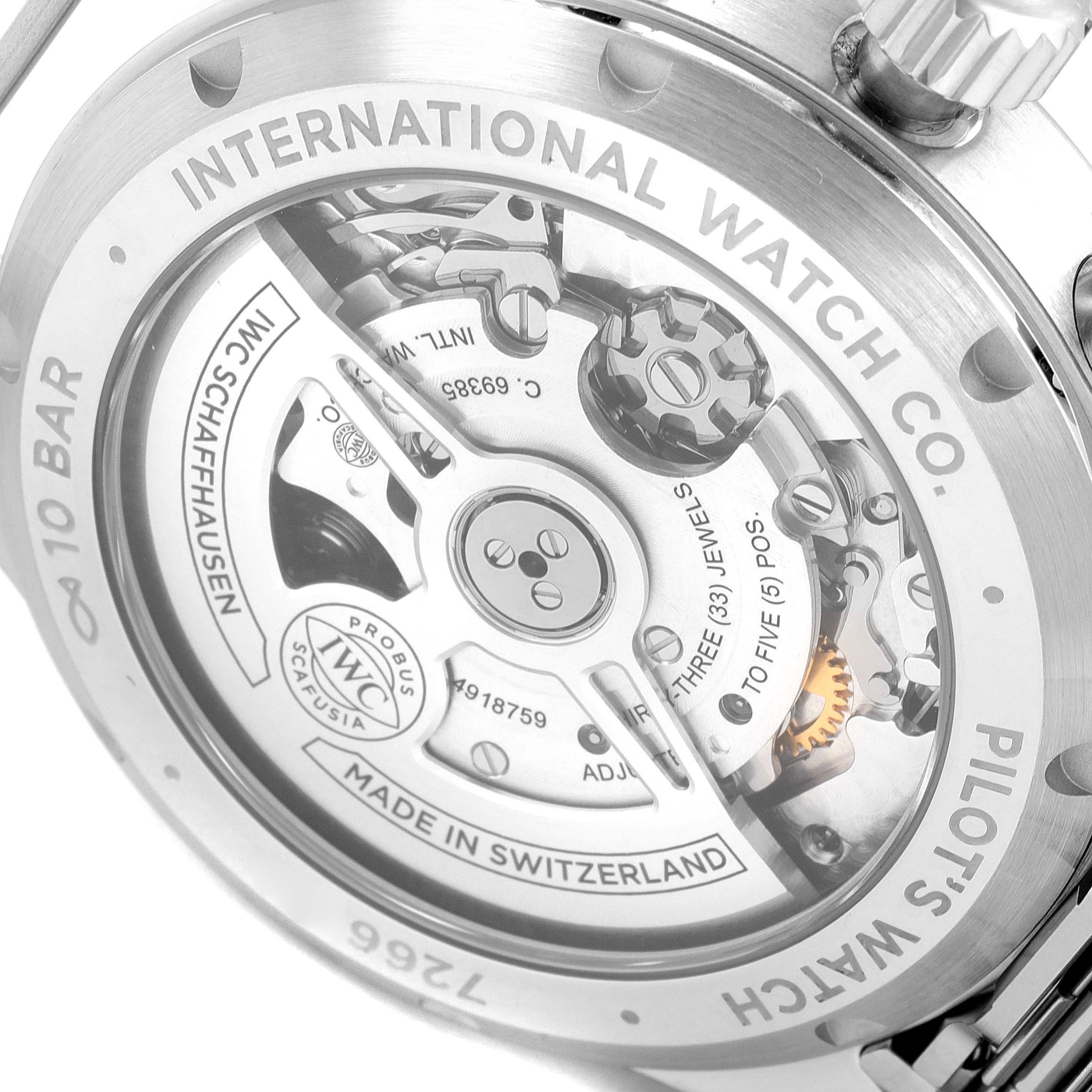 The image shows the back view of an IWC Pilot IW388102 Men's Stainless Steel Blue Dial IW388102 Men's Stainless Steel Blue Dial watch, clearly displaying its internal mechanism and engravings.