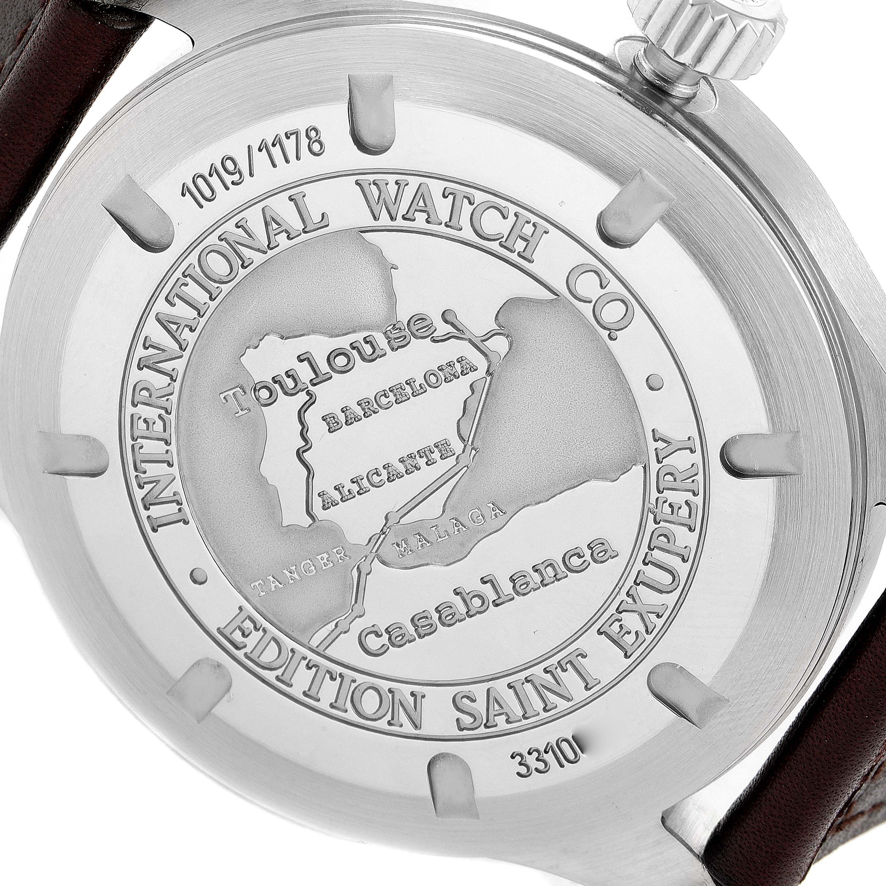 This image shows the back case of an IWC Pilot IW320104 Men's Stainless Steel Brown Dial IW320104 Men's Stainless Steel Brown Dial model watch with engraved markings and cities.