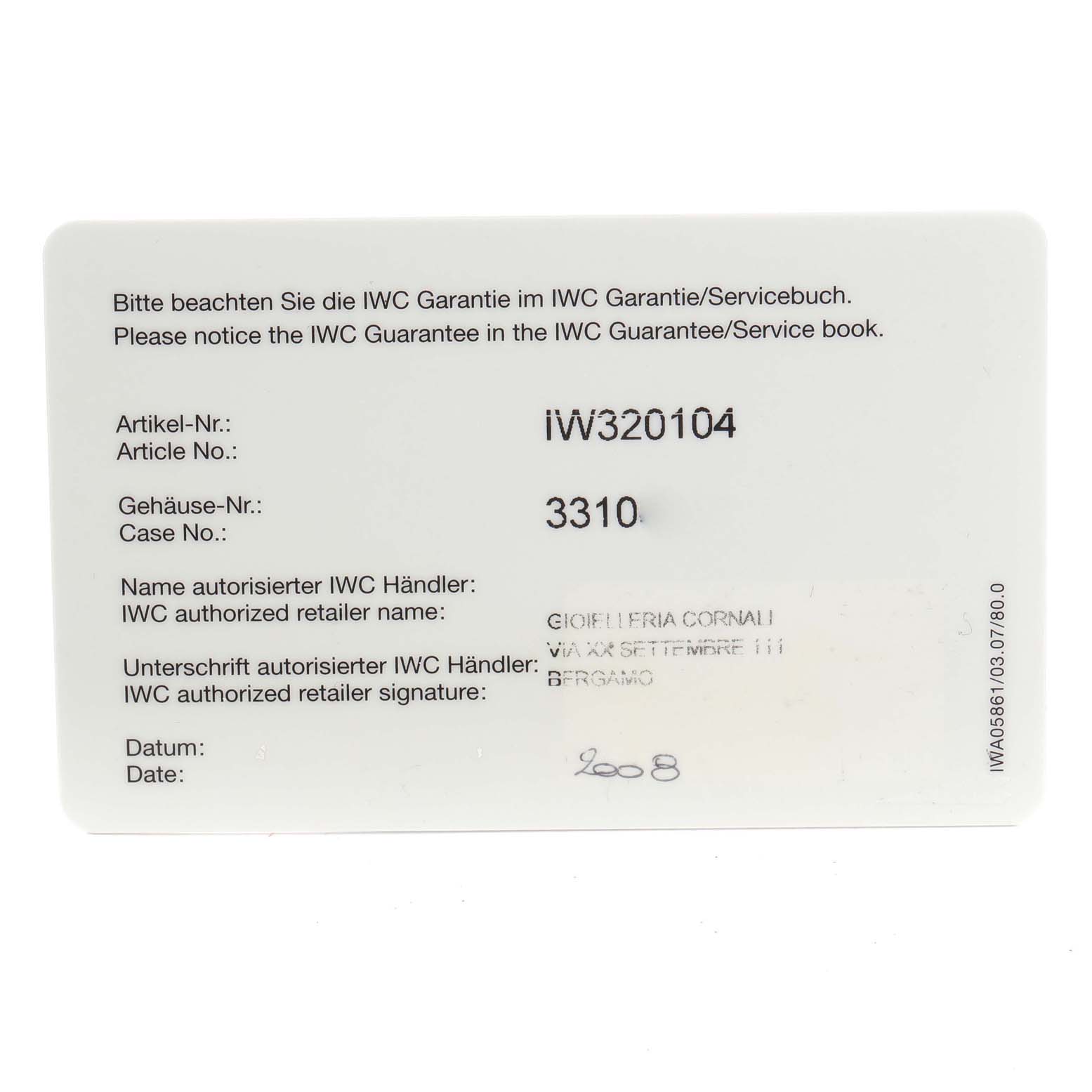 This image shows a warranty or guarantee card for the IWC Pilot IW320104 Men's Stainless Steel Brown Dial IW320104 Men's Stainless Steel Brown Dial model watch, displaying article and case numbers.